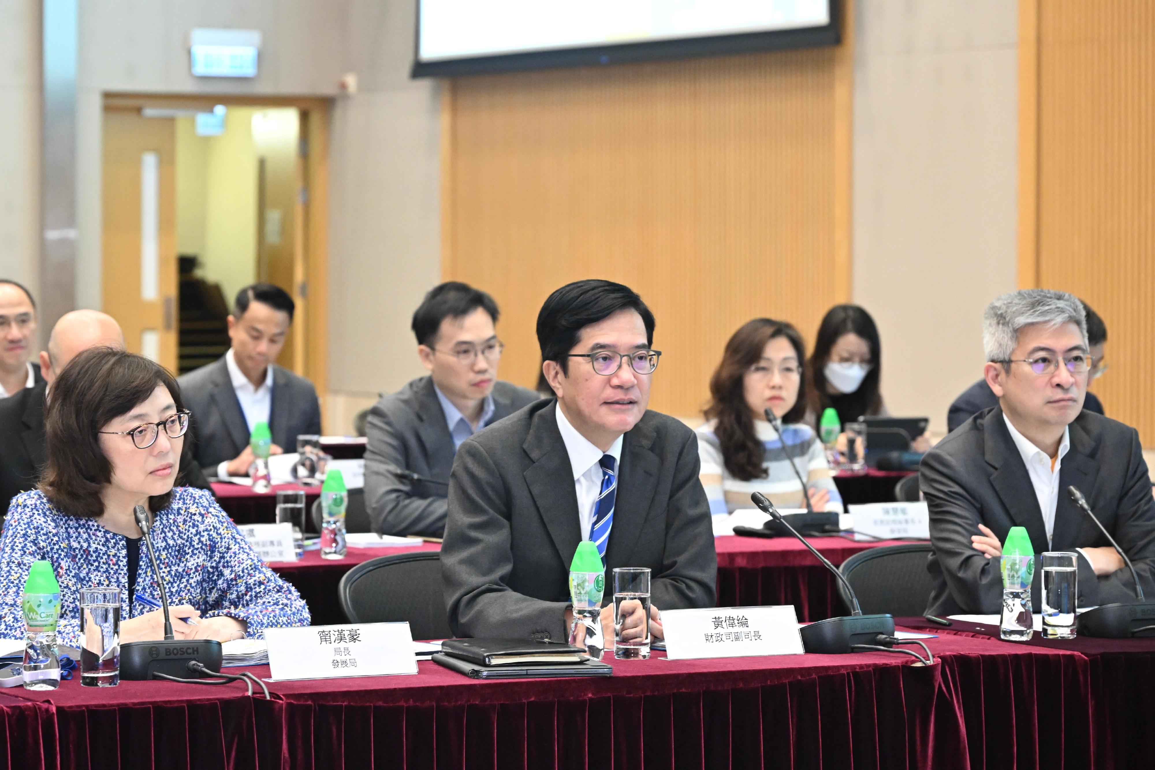 The Deputy Financial Secretary, Mr Michael Wong, and Vice Mayor of the Shenzhen Municipal People's Government Mr Tao Yongxin, leading delegations of the governments of the Hong Kong Special Administrative Region and Shenzhen respectively, held the fourth meeting of the Task Force for Collaboration on the Northern Metropolis Development Strategy in Hong Kong today (February 7). Photo shows Mr Wong (centre) giving opening remarks at the meeting. Looking on are the Secretary for Development, Ms Bernadette Linn (left), and the Under Secretary for Culture, Sports and Tourism, Mr Raistlin Lau (right).