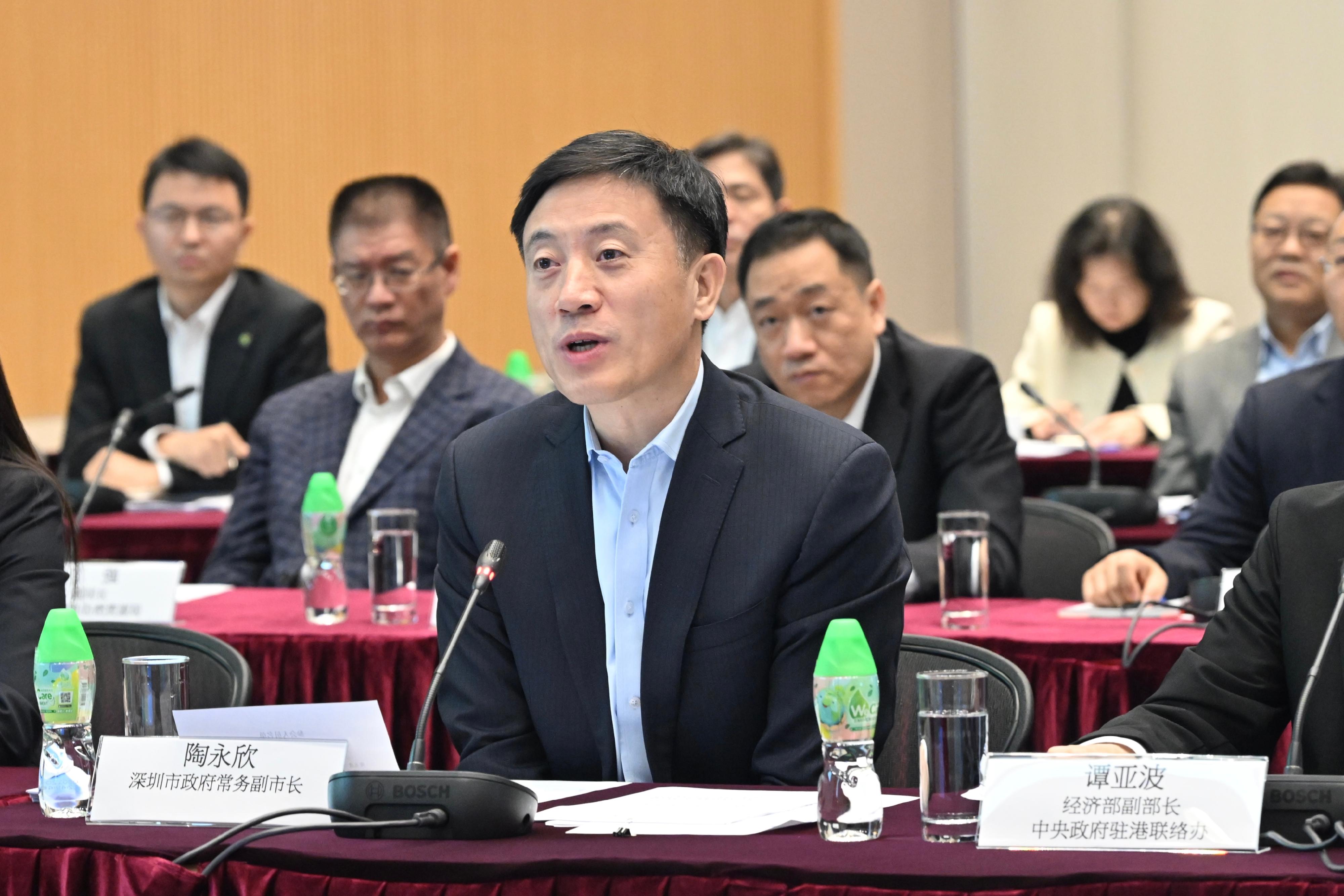 The Deputy Financial Secretary, Mr Michael Wong, and Vice Mayor of the Shenzhen Municipal People's Government Mr Tao Yongxin (first row, centre), leading delegations of the governments of the Hong Kong Special Administrative Region and Shenzhen respectively, held the fourth meeting of the Task Force for Collaboration on the Northern Metropolis Development Strategy in Hong Kong today (February 7).