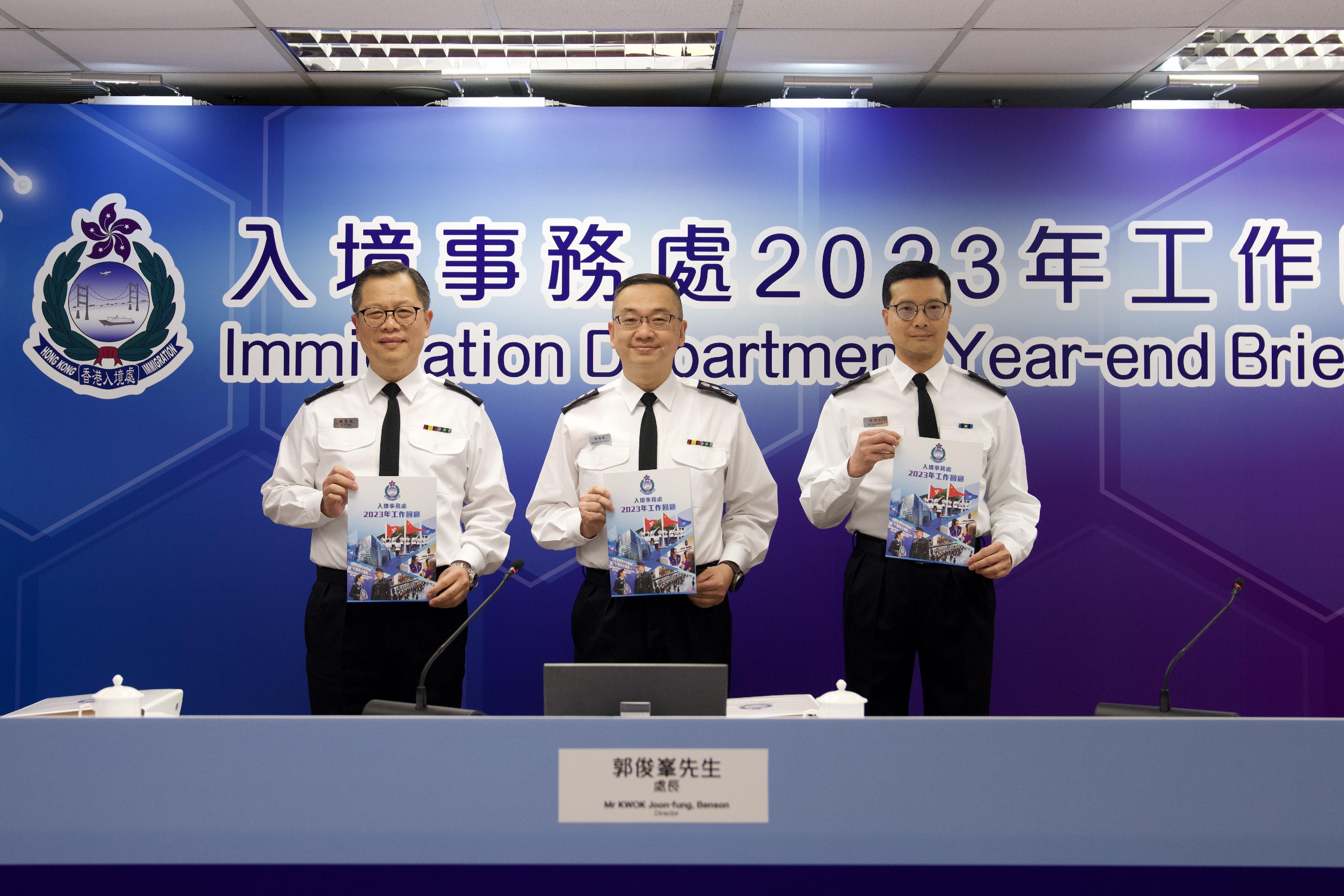 The Immigration Department's year-end review of 2023 was held today (February 8). Photo shows the Director of Immigration, Mr Benson Kwok (centre); the Deputy Director (Enforcement, Systems and Management), Mr Tai Chi-yuen (left); and the Deputy Director (Control, Visa and Documents), Mr Ching Wo-mok (right).