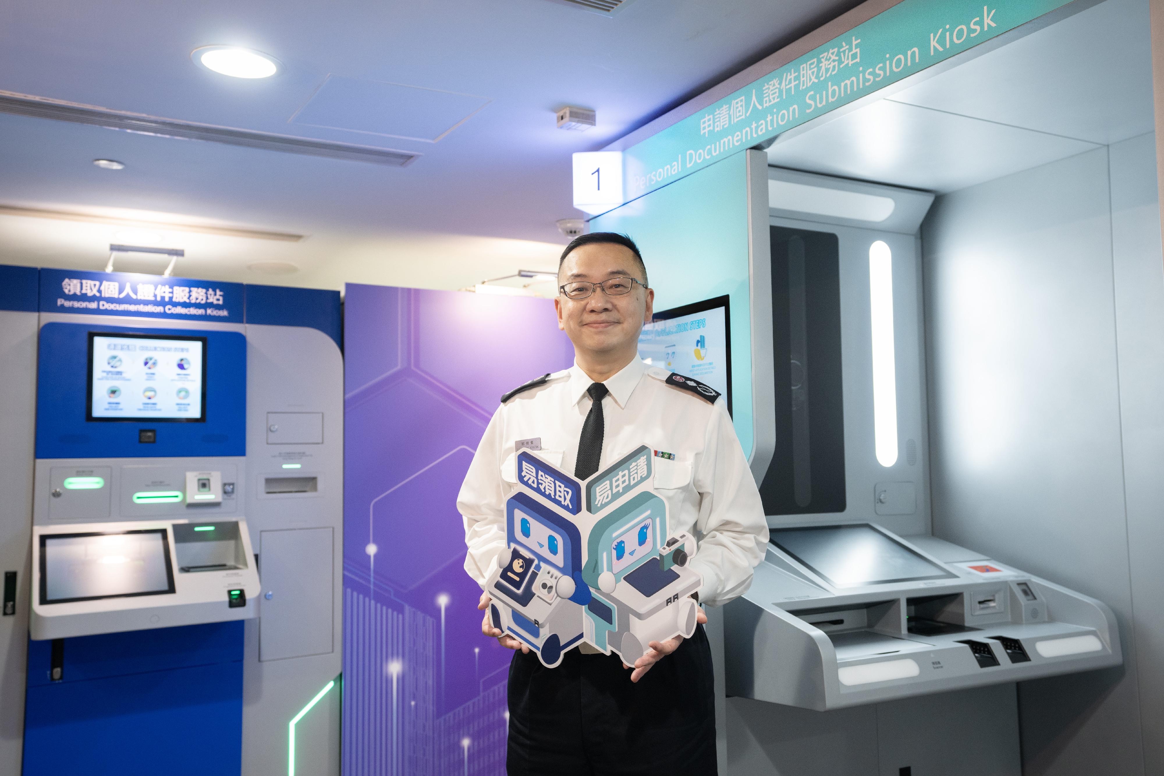 The Immigration Department's year-end review of 2023 was held today (February 8). Photo shows the Director of Immigration, Mr Benson Kwok, introducing the new Personal Documentation Submission Kiosk and Personal Documentation Collection Kiosk.