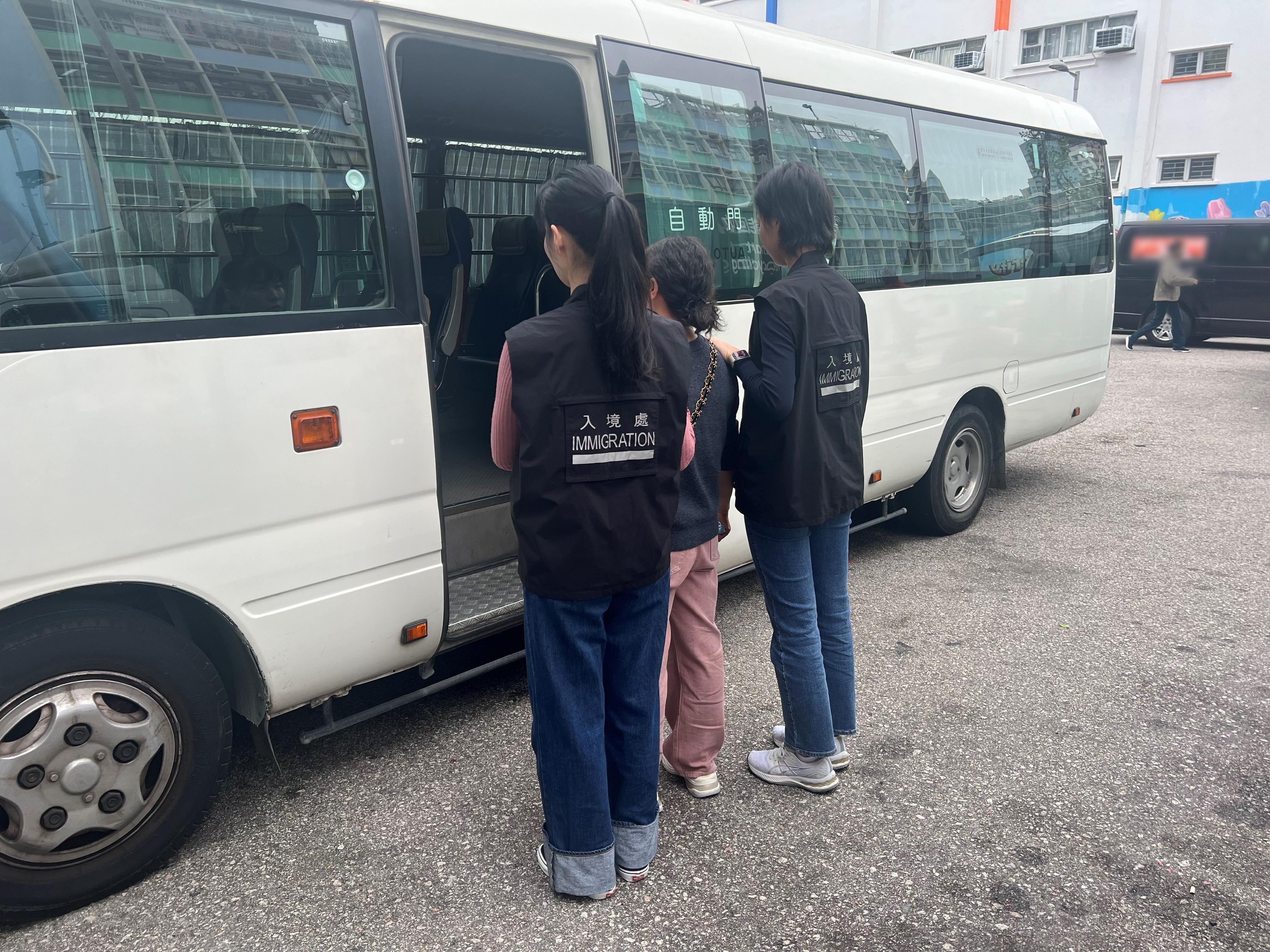 The Immigration Department mounted a series of territory-wide anti-illegal worker operations codenamed "Twilight" and joint operations with the Hong Kong Police Force and the Labour Department to combat illegal employment activities at Lunar New Year fairs for four consecutive days from February 5 to yesterday (February 8). Photo shows a suspected illegal worker arrested during an operation.