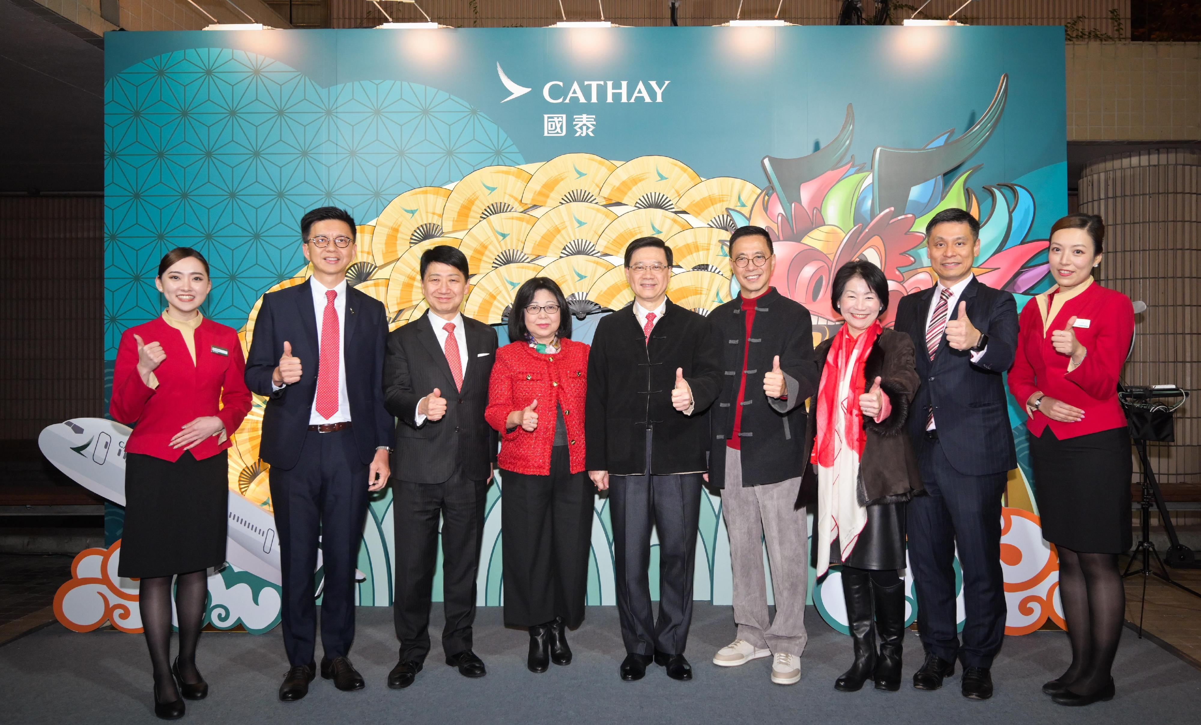 The Chief Executive, Mr John Lee, attended the 2024 International Chinese New Year Night Parade tonight (February 10). Photo shows (from second left) the Chief Executive Officer of the Cathay Pacific Group, Mr Ronald Lam; the Chairman of the Hong Kong Tourism Board, Dr Pang Yiu-kai; Mr Lee and his wife; and the Secretary for Culture, Sports and Tourism, Mr Kevin Yeung.
