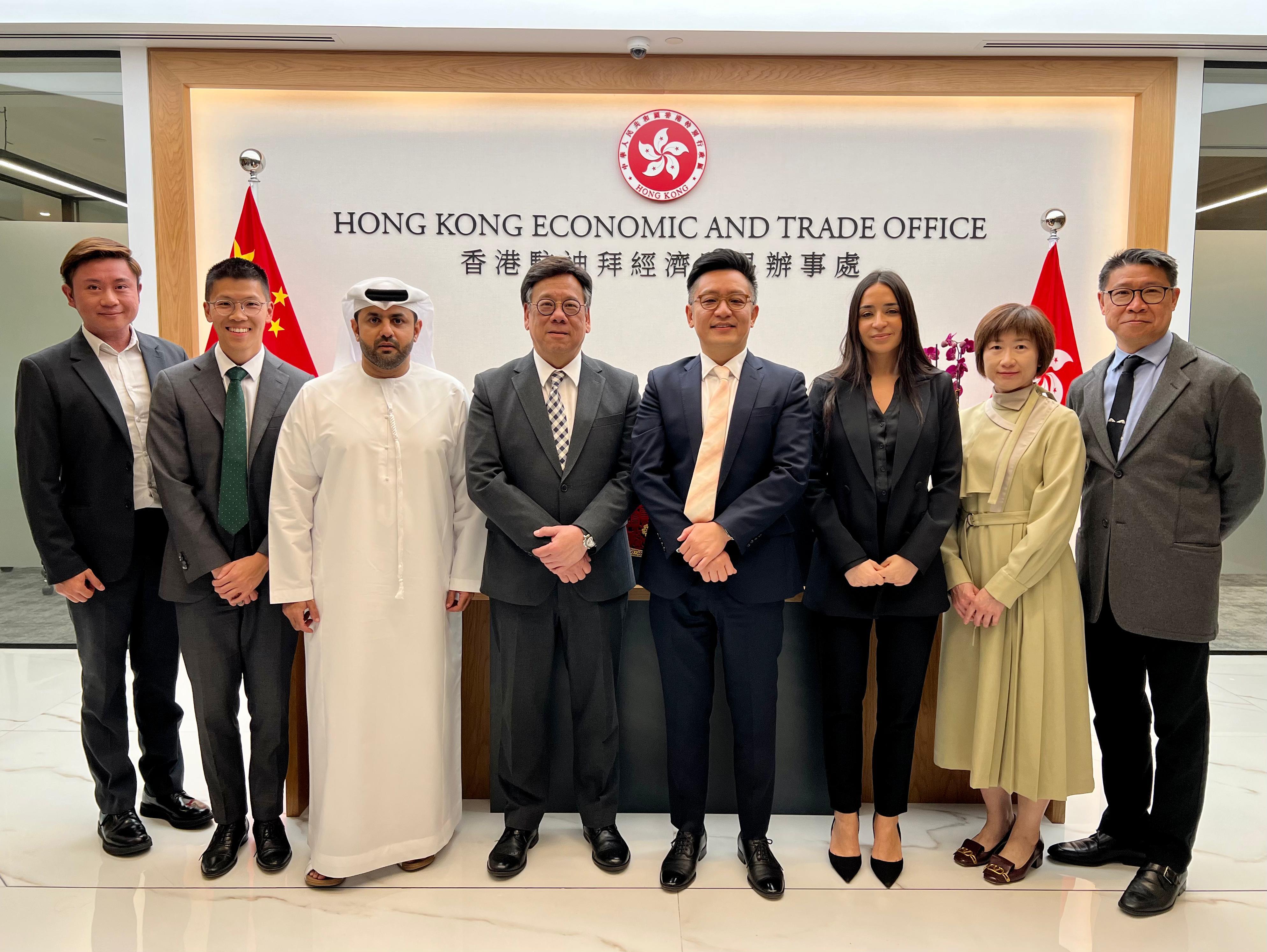 The Secretary for Commerce and Economic Development, Mr Algernon Yau, attended the World Governments Summit 2024 in Dubai, the United Arab Emirates. During his stay in Dubai, Mr Yau today (February 13) visited the Hong Kong Economic and Trade Office in Dubai (Dubai ETO) to learn more about the work of the office. Photo shows Mr Yau (fourth left), the Director-General of the Dubai ETO, Mr Damian Lee (fourth right), and other colleagues.
