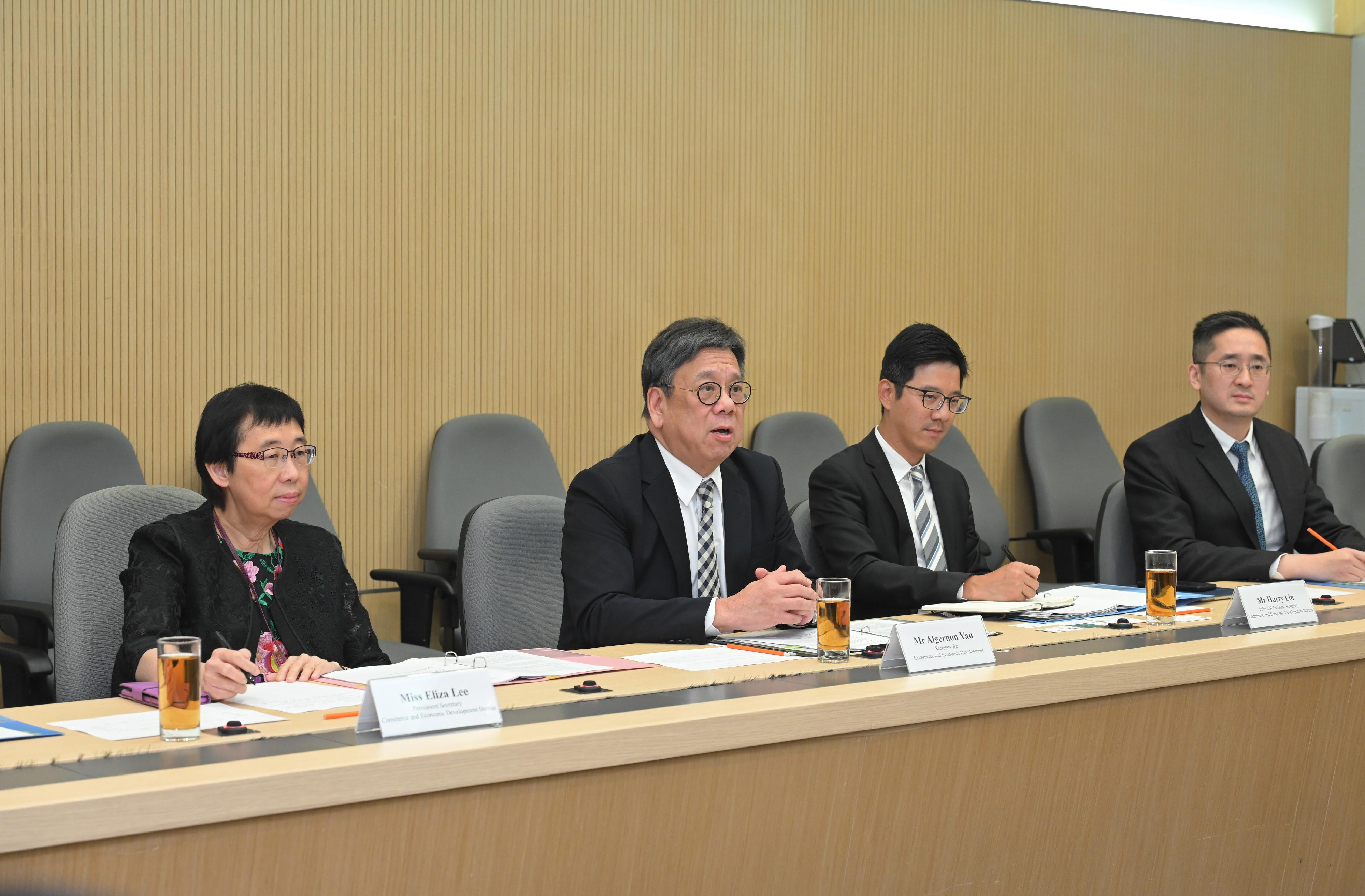 Chaired by the Secretary for Commerce and Economic Development, Mr Algernon Yau (second left), the Advisory Panel on Silver Economy today (February 20) convenes its first meeting to conduct a research on the market demand and development of the "silver economy". The Permanent Secretary for Commerce and Economic Development, Miss Eliza Lee (first left), and the Under Secretary for Commerce and Economic Development, Dr Bernard Chan (first right), also attend the meeting.