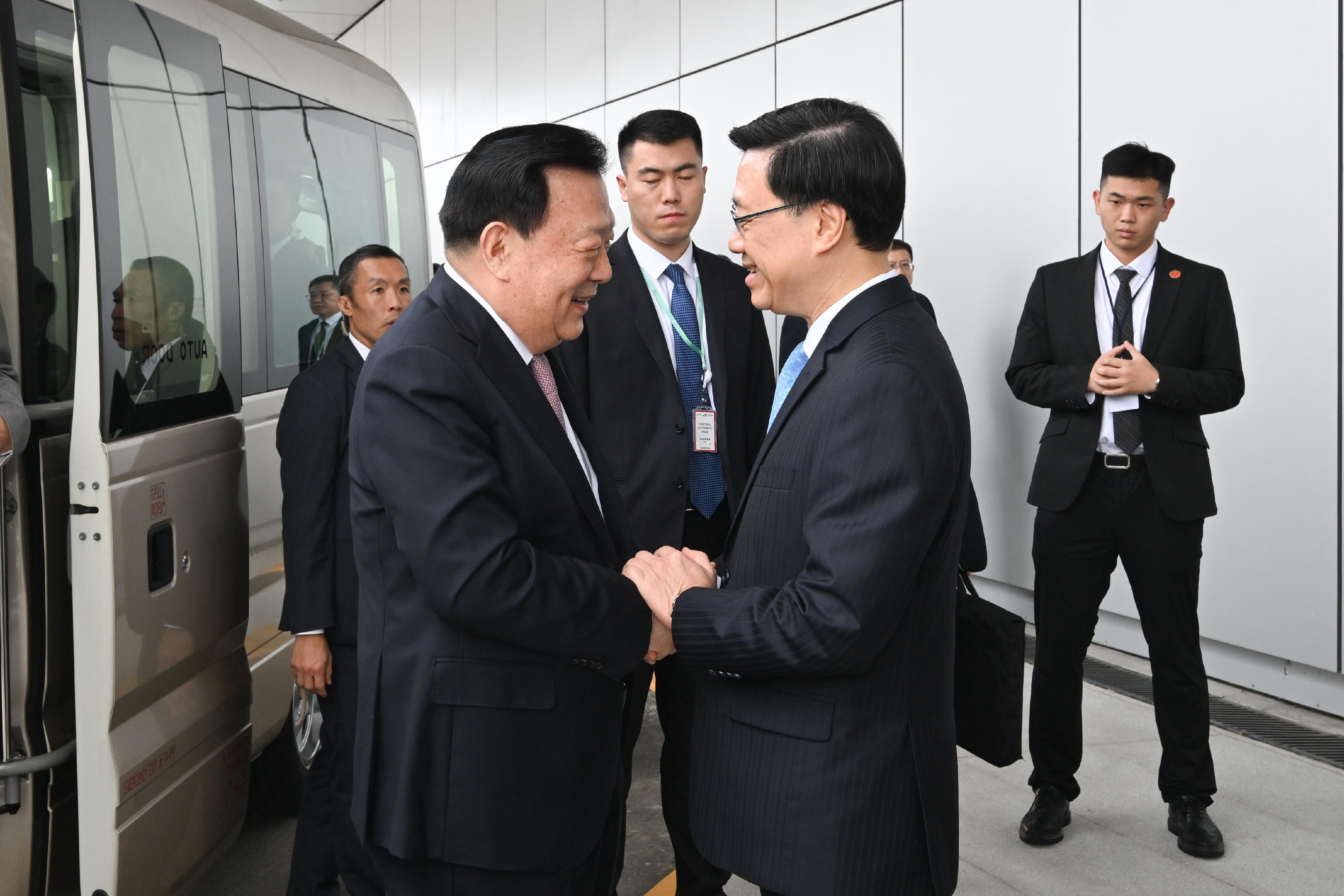 The Director of the Hong Kong and Macao Work Office of the Communist Party of China Central Committee and the Hong Kong and Macao Affairs Office of the State Council, Mr Xia Baolong, arrived in Hong Kong for his seven-day inspection visit today (February 22). Photo shows Mr Xia (first left), accompanied by the Chief Executive, Mr John Lee (second left), visiting the Integrated Airport Centre at Hong Kong International Airport.