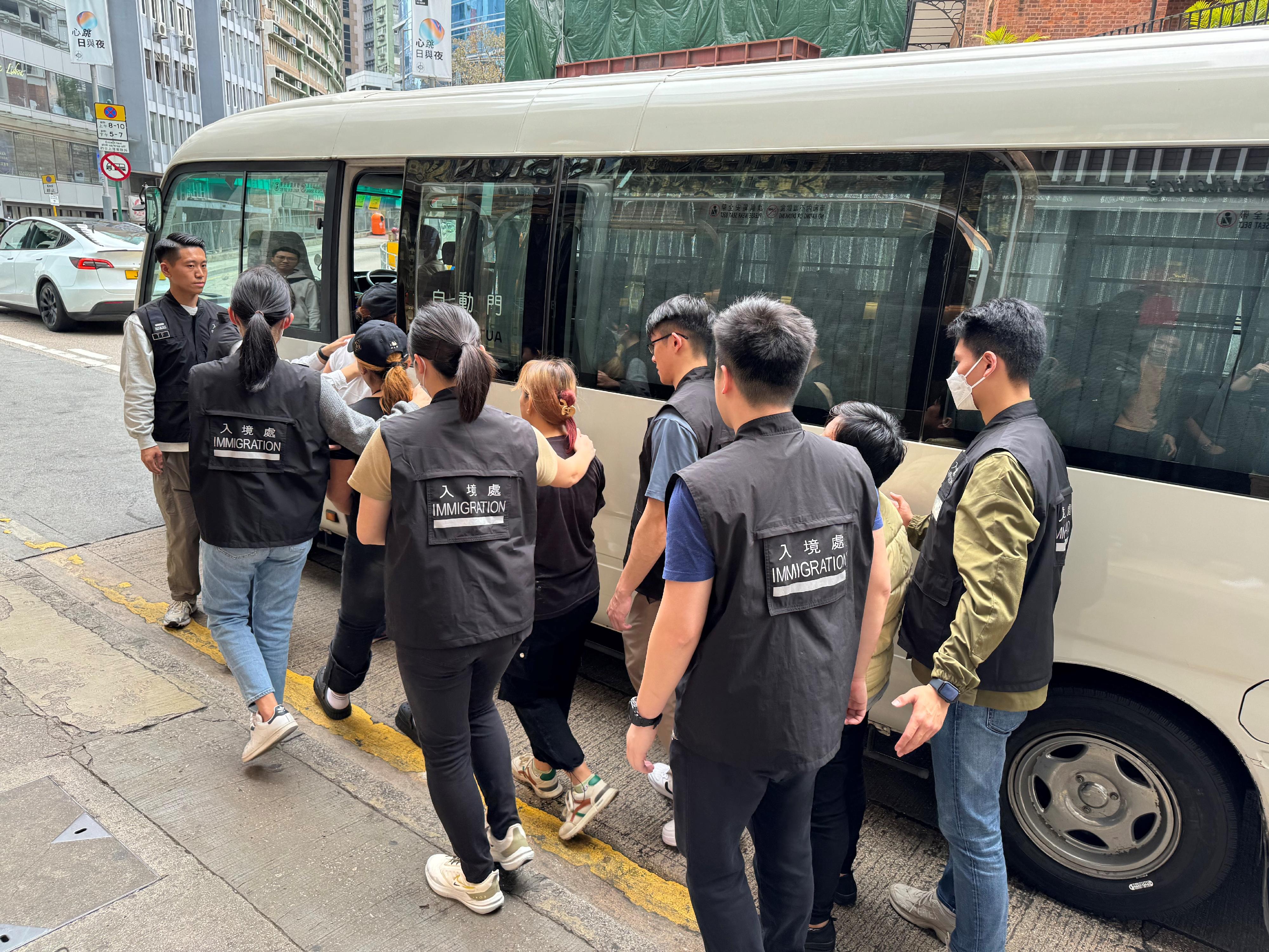 The Immigration Department mounted a series of territory-wide anti-illegal worker operations codenamed "Twilight" and joint operations with the Hong Kong Police Force codenamed "Champion" and "Windsand" for four consecutive days from February 19 to yesterday (February 22). Photo shows suspected illegal workers arrested during an operation.