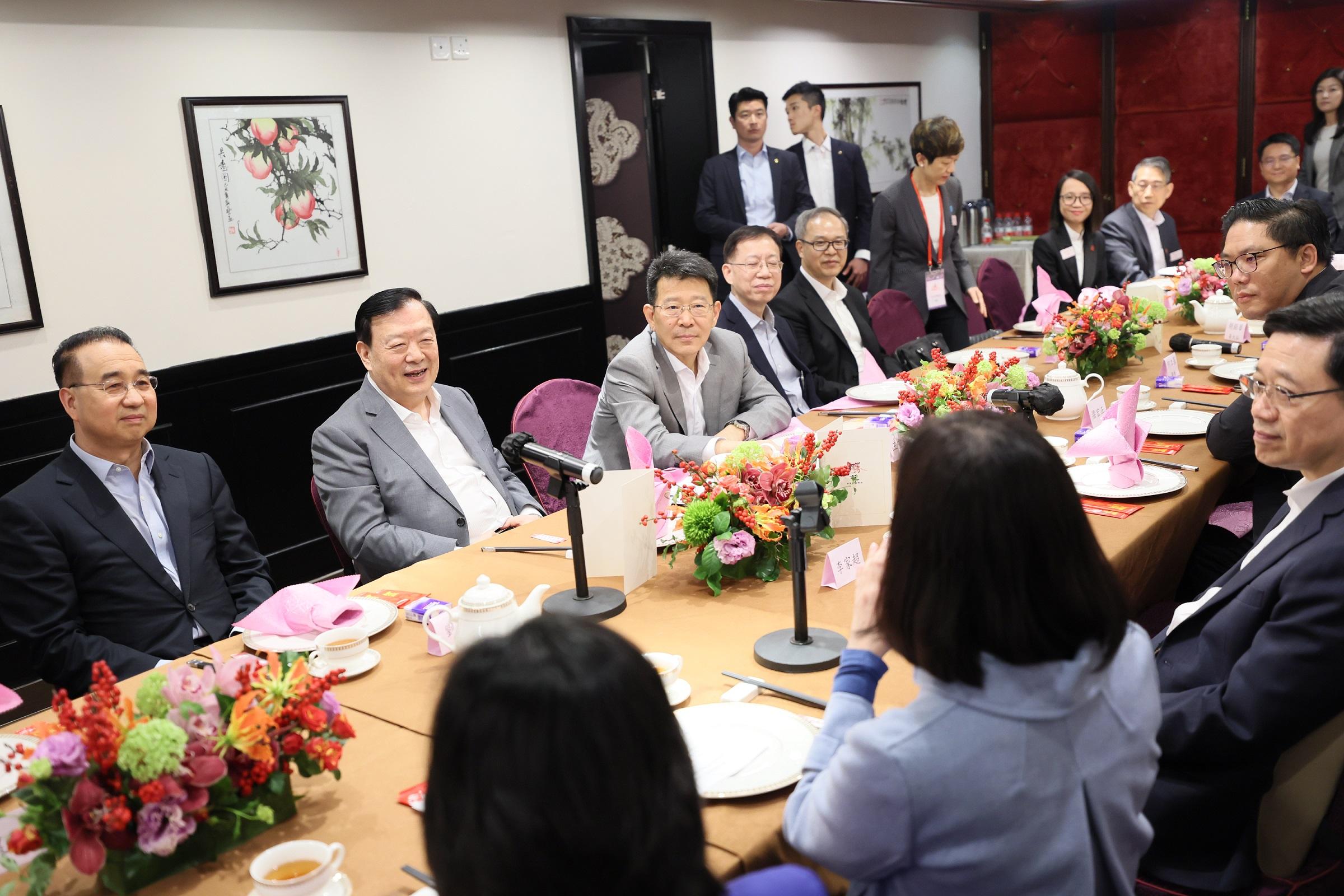 The Director of the Hong Kong and Macao Work Office of the Communist Party of China Central Committee and the Hong Kong and Macao Affairs Office of the State Council, Mr Xia Baolong, continued his inspection visit to Hong Kong and inspected the city's district governance today (February 24). Photo shows Mr Xia (second left) having a working lunch with the chairmen of the 18 District Councils to interact with them and exchange views on district governance issues.