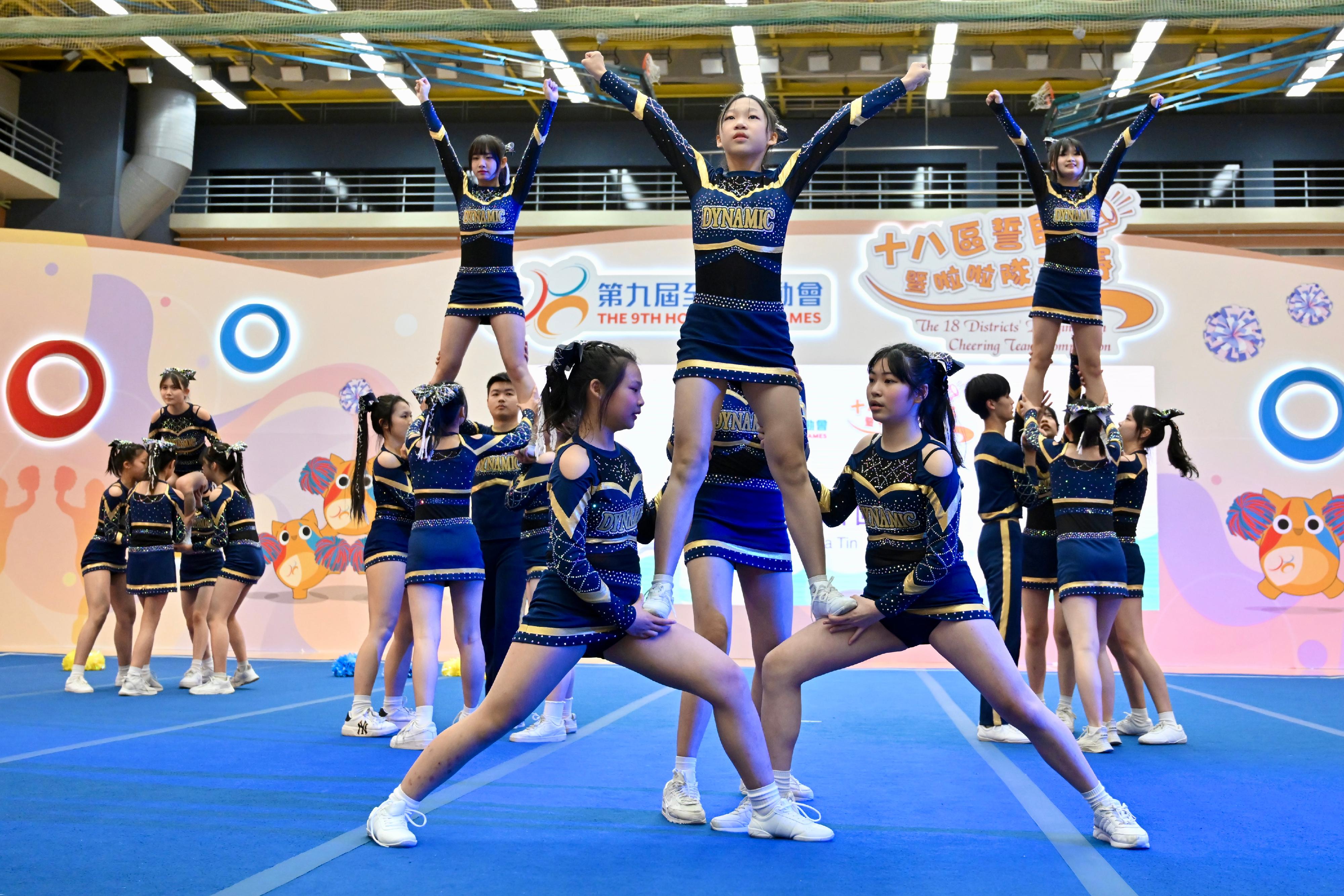 The cheering teams vie for the Best Performance Award, the Best Local Characteristics Award and the Highest Popularity Award at the 18 Districts' Cheering Team Competition of the 9th Hong Kong Games held today (February 25).