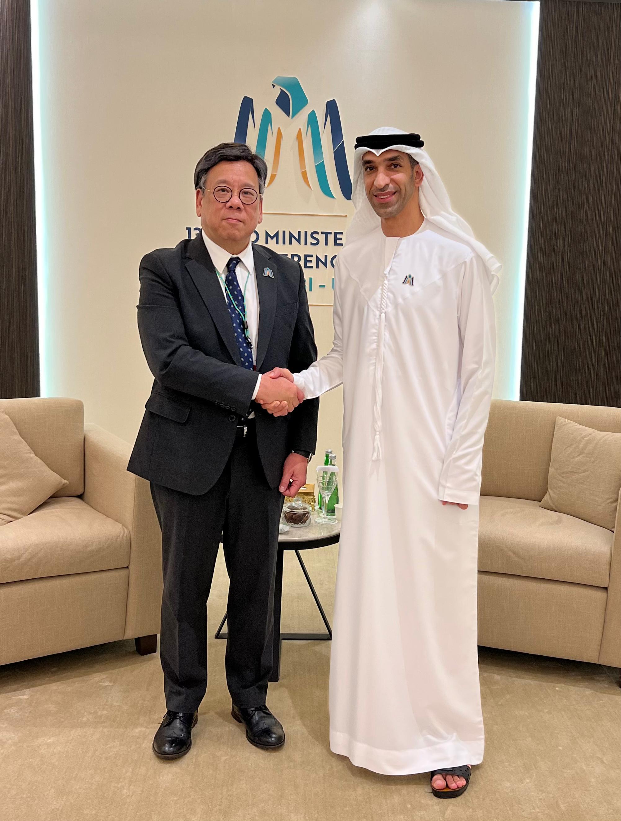 The Secretary for Commerce and Economic Development, Mr Algernon Yau (left), meets with the Minister of State for Foreign Trade of the United Arab Emirates (UAE), Dr Thani bin Ahmed Al Zeyoudi (right), on the sidelines of the 13th World Trade Organization Ministerial Conference in Abu Dhabi, the UAE, on February 25 (Abu Dhabi time) to exchange views on issues of mutual interest.