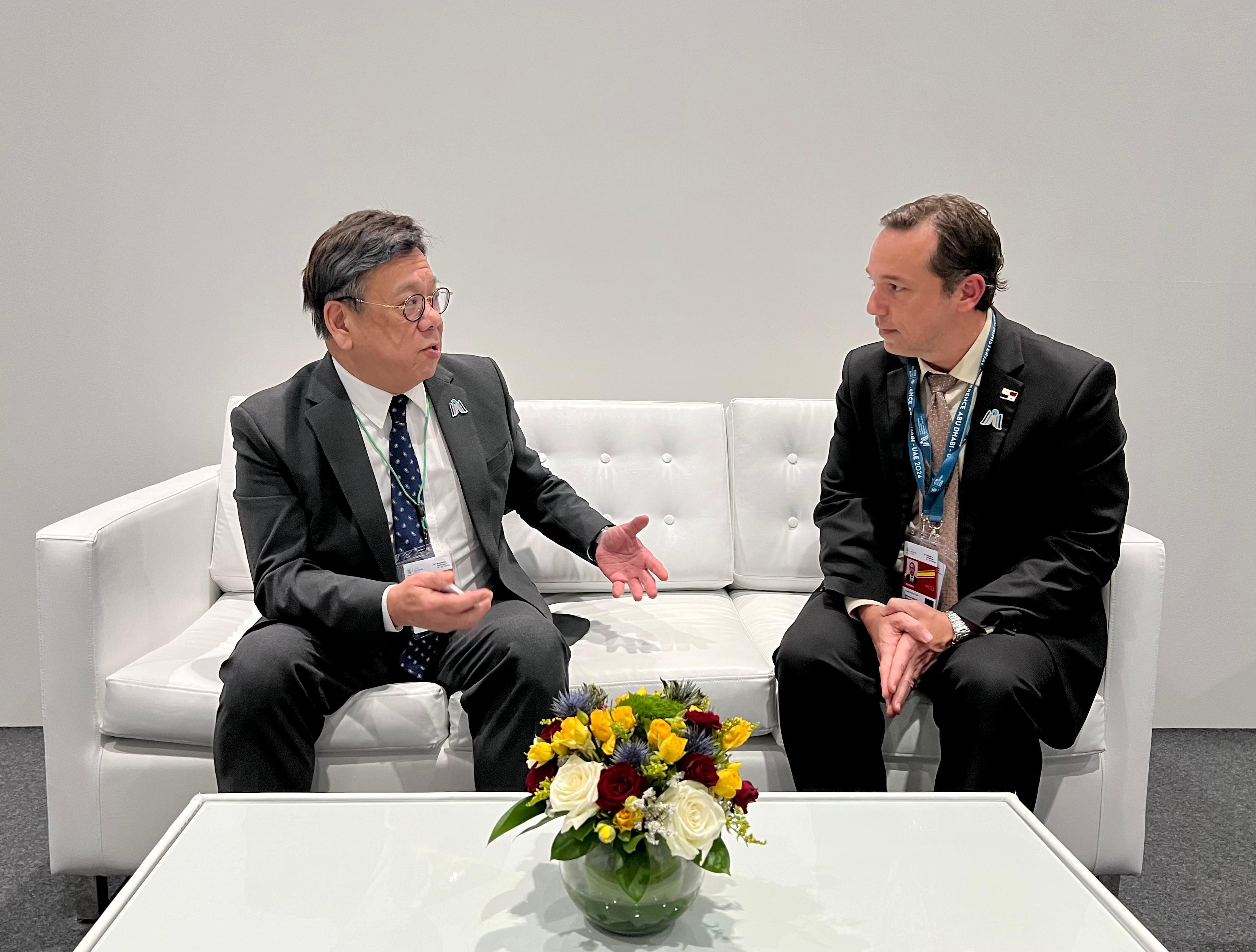The Secretary for Commerce and Economic Development, Mr Algernon Yau (left), meets with the Minister of Commerce and Industries of Panama, Dr Jorge Rivera Staff (right), on the sidelines of the 13th World Trade Organization Ministerial Conference in Abu Dhabi, the United Arab Emirates, on February 25 (Abu Dhabi time) to exchange views on issues of mutual interest.