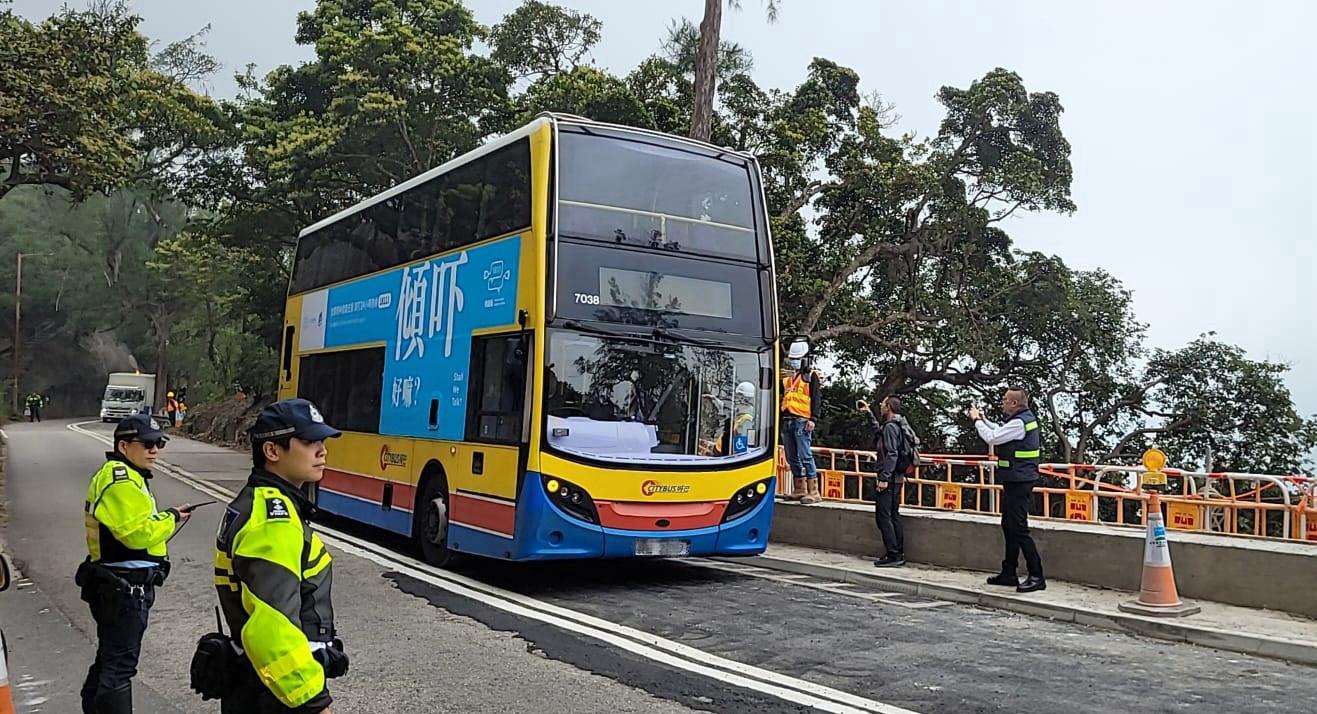 The two-lane traffic arrangement at Shek O Road near Lan Nai Wan was fully resumed today (February 29) in the afternoon. Photo shows a bus trial run conducted before the reopening of the road section. 