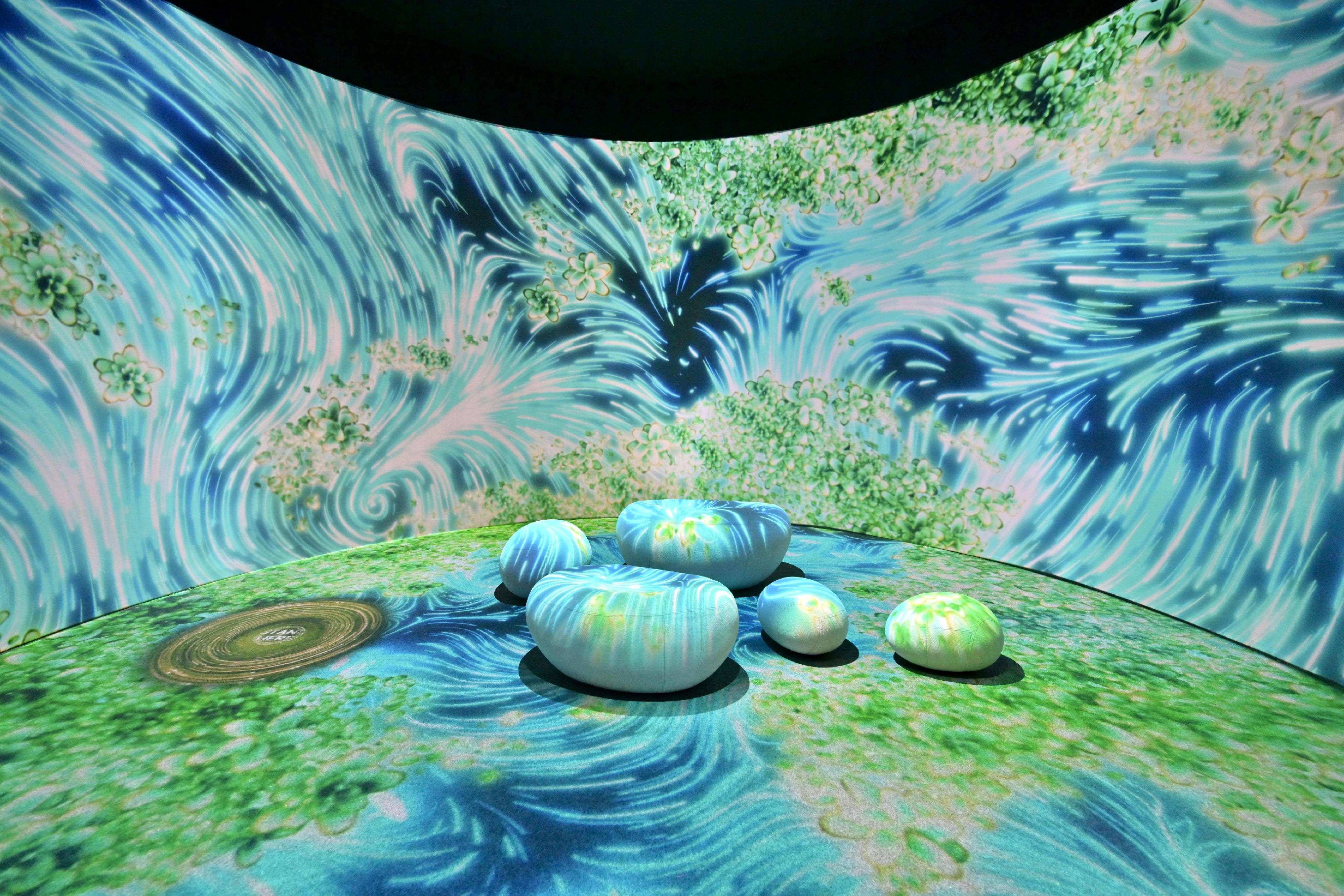 The "Immersive Hong Kong" roving exhibition, which showcases Hong Kong's unique strengths, advantages and opportunities with art technology, was launched in Kuala Lumpur, Malaysia, today (March 3) as part of a promotional campaign in Association of Southeast Asian Nations countries. Photo shows an art projection with the theme of "Diversity and Greenery" at the exhibition.
