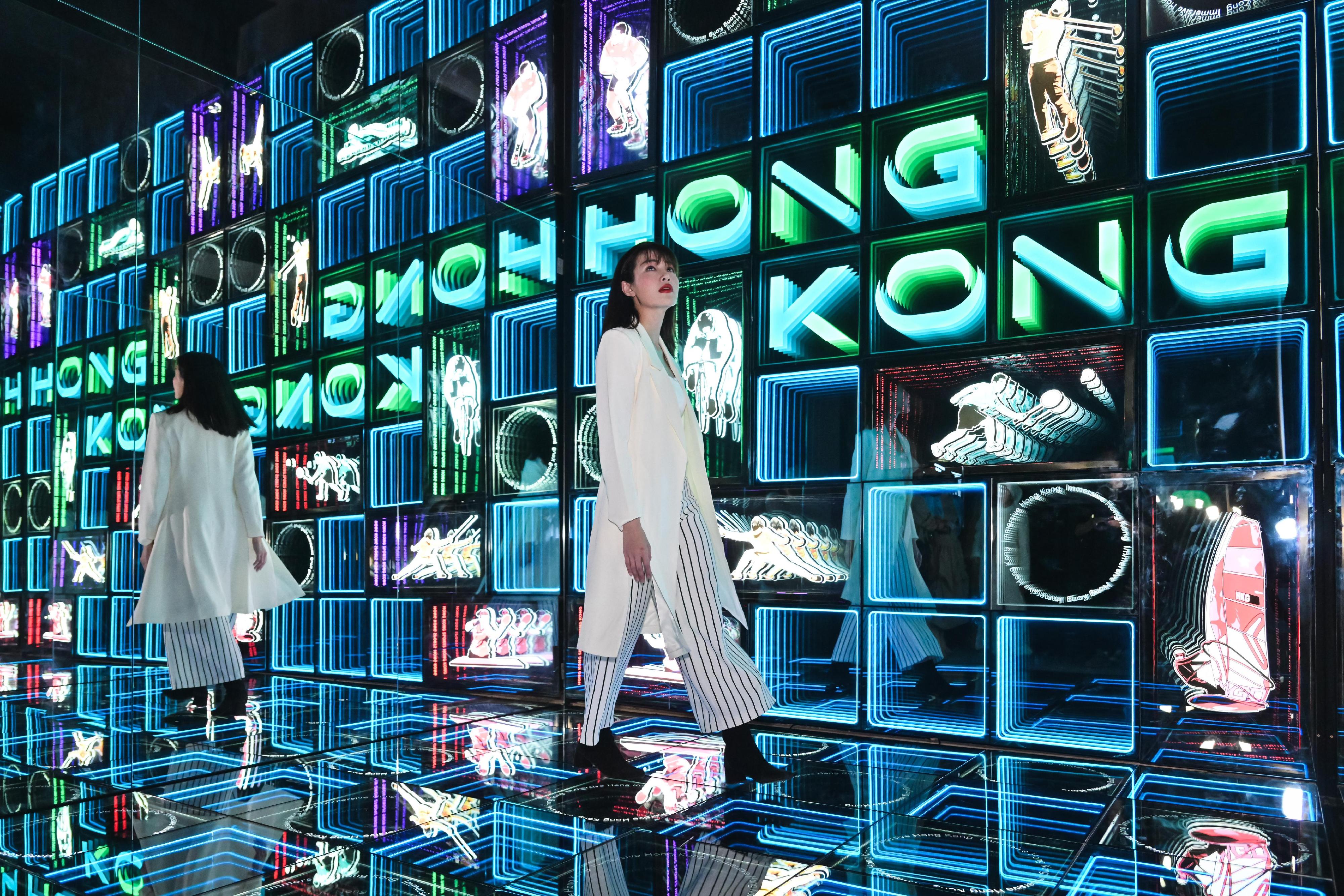 The "Immersive Hong Kong" roving exhibition, which showcases Hong Kong's unique strengths, advantages and opportunities with art technology, was launched in Kuala Lumpur, Malaysia, today (March 3) as part of a promotional campaign in Association of Southeast Asian Nations countries. Photo shows the light box installations with the theme of "Buzzing Sports Action" at the exhibition.