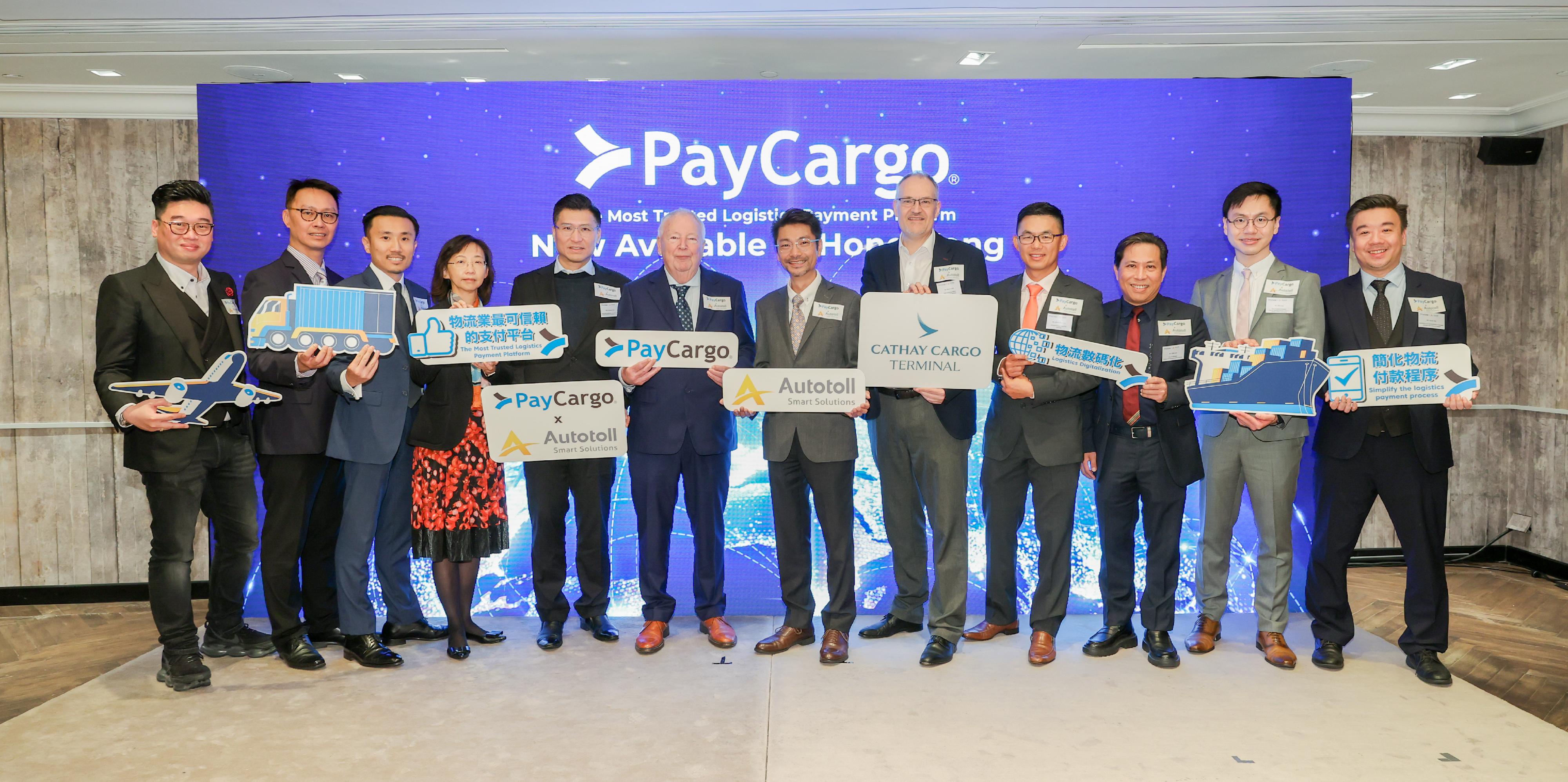 Invest Hong Kong (InvestHK) announced today (March 4) that it has assisted a United States logistics industry multi-modal payment network, PayCargo, to open its first regional office in Hong Kong as part of its overseas expansion plan in Asia via the city. Photo shows (from left) Senior Business Advisor of PayCargo Continental Asia Limited Mr Ryan Ngan; the General Manager of IoT & Telematics of Autotoll International Limited, Mr Owen Leung; the Commercial Director, Asia of PayCargo Continental Asia Limited, Mr Morgan Law; the Deputy Head of Financial Services & Fintech of InvestHK, Ms Karen Mak; Legislative Council Member (Functional Constituency - Technology and Innovation) Mr Duncan Chiu; the Chief Executive Officer of PayCargo International, Mr Adrie Reinders; the Deputy Chief Executive Officer of Autotoll International Limited, Mr Karel Au; the Chief Operating Officer of Cathay Cargo Terminal, Mr Mark Watts; the General Manager, Australia of PayCargo, Mr Alvan Aiau Yong; the General Manager of Dimerco Air Forwarders (H.K.) Limited, Mr Eddie Law; the Vice President (Fintech) of the Office for Attracting Strategic Enterprises, Mr Max Lau; and Marketing and Communications Manager of Autotoll International Limited Mr Henry Yau at the opening ceremony.

