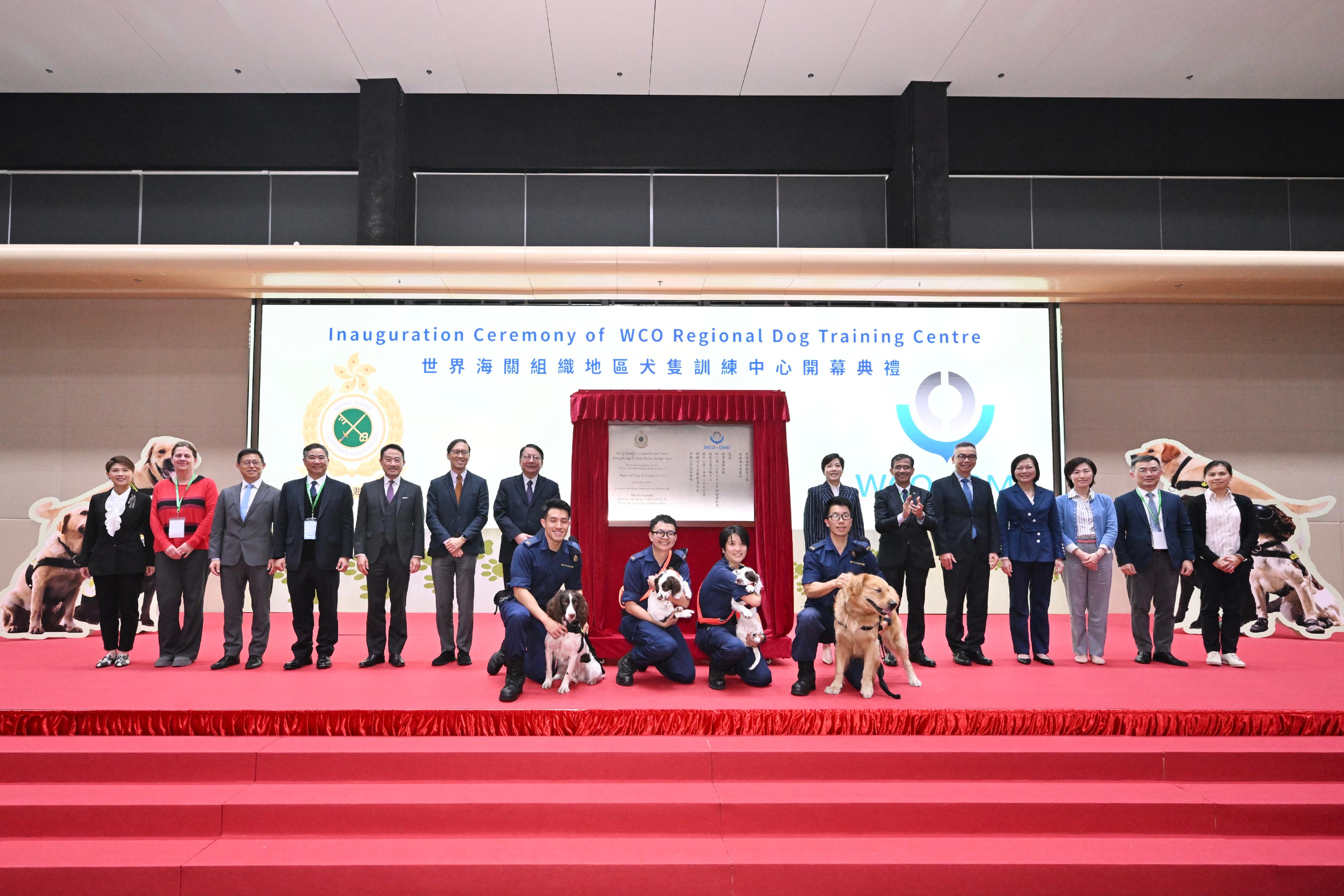 The Chief Secretary for Administration, Mr Chan Kwok-ki, attended the Inauguration Ceremony of WCO (World Customs Organization) Regional Dog Training Centre today (March 6). Photo shows (back row, from seventh left) Mr Chan; the Commissioner of Customs and Excise, Ms Louise Ho; the WCO Director for Compliance and Facilitation, Mr Pranab Kumar Das, and other guests at the ceremony.
