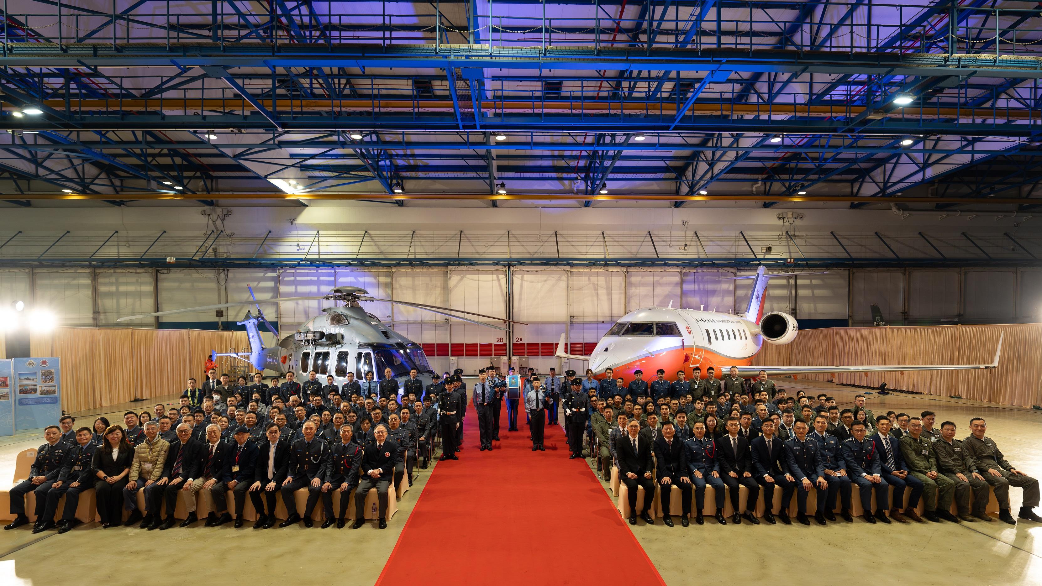 The Government Flying Service and the Hong Kong Air Cadet Corps (HKACC) signed a Memorandum of Administrative Arrangements today (March 9). Photo shows the Under Secretary for Security, Mr Michael Cheuk, taking a group photo with guests and the HKACC members.