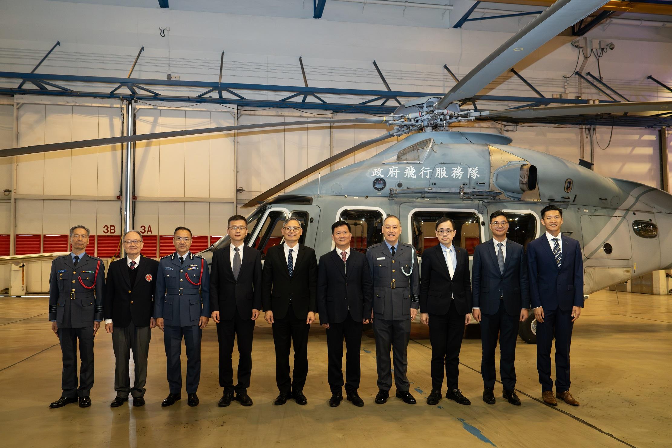 The Government Flying Service (GFS) and the Hong Kong Air Cadet Corps (HKACC) signed a Memorandum of Administrative Arrangements today (March 9).  Photo shows the Under Secretary for Security, Mr Michael Cheuk (fifth left); the Director General of the Police Liaison Department of the Liaison Office of the Central People's Government in the Hong Kong Special Administrative Region (LOCPG), Mr Chen Feng (fifth right); Second-level inspector of the Youth Department of the LOCPG, Mr Cui Feng (fourth left); Legislative Council members and other guests taking a group photo during their visit to the GFS Headquarters after the signing ceremony.