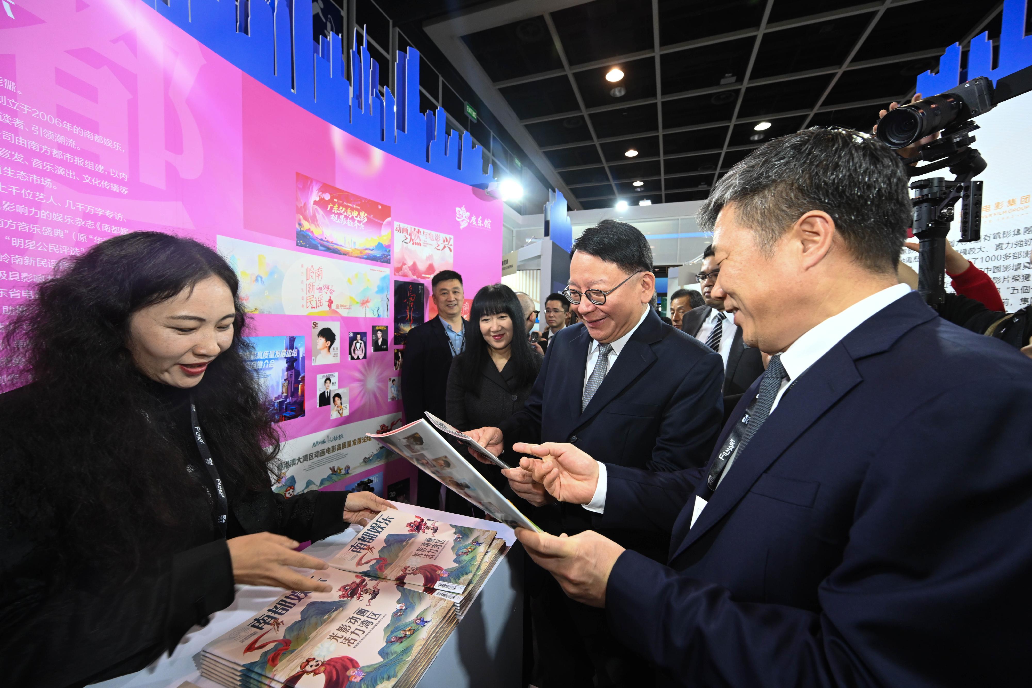 The Chief Secretary for Administration, Mr Chan Kwok-ki, attended the Kick-off Ceremony of Entertainment Expo Hong Kong 2024 today (March 11). Photo shows Mr Chan (second right) touring the exhibition.


