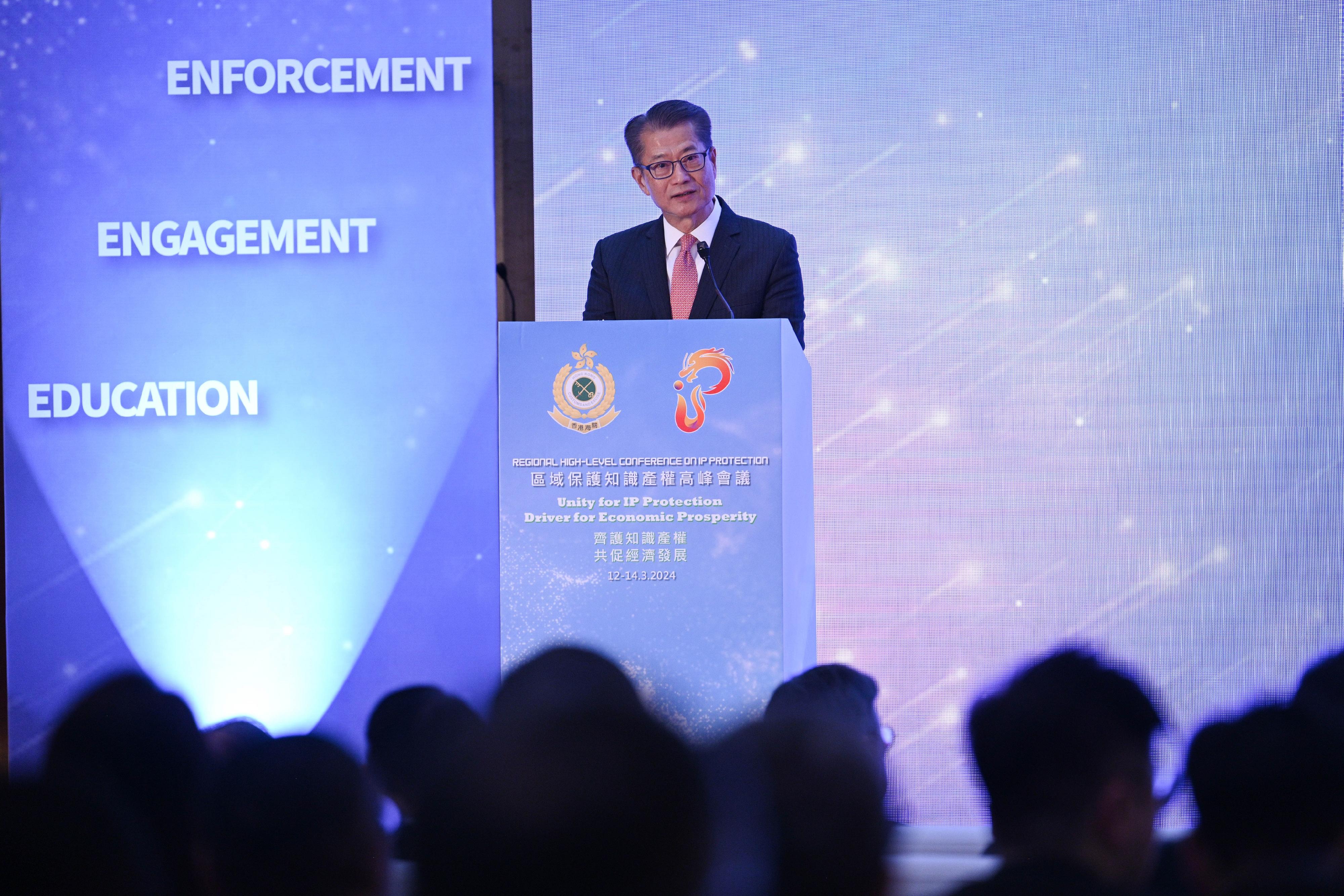 The Financial Secretary, Mr Paul Chan, attended the Regional High-Level Conference on Intellectual Property Protection today (March 12). Photo shows Mr Chan delivering a speech at the conference.