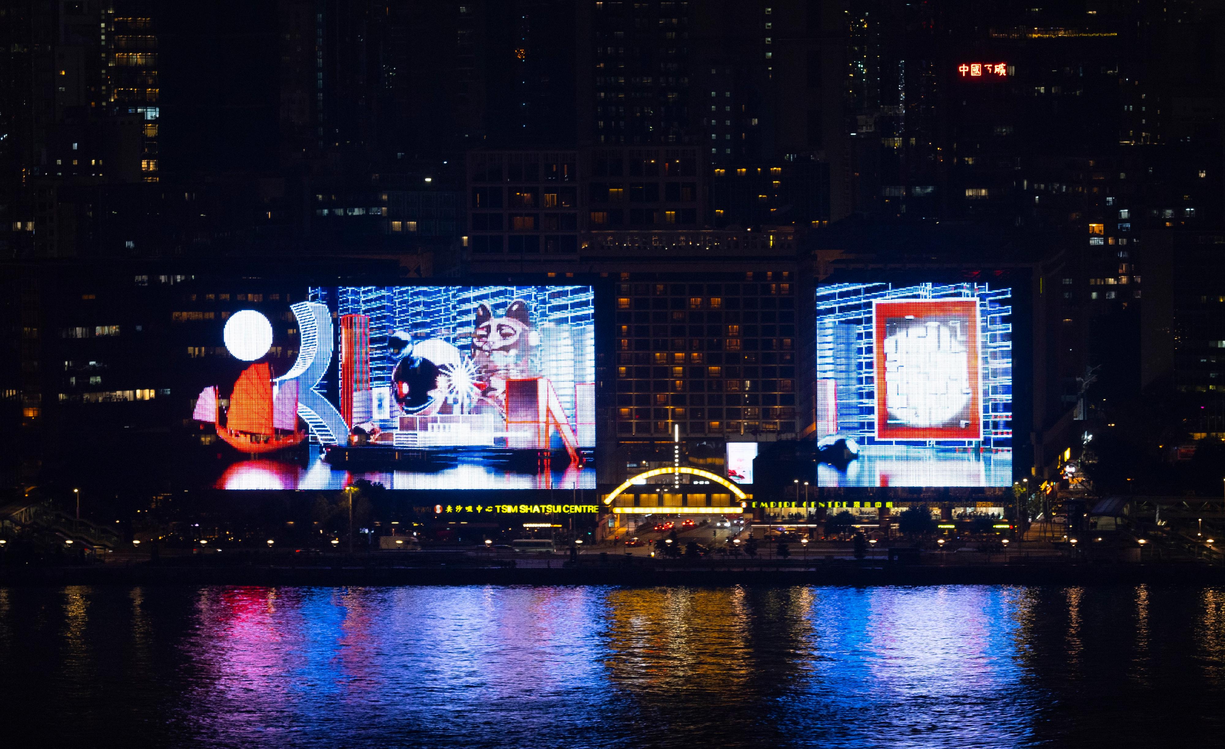 The Leisure and Cultural Services Department will present the large-scale outdoor art project "Art@Harbour 2024" on both sides of Victoria Harbour. Photo shows an artist's impression of the "Chromaflux" exhibition at the Sino LuminArt Façade, an initiative independently orchestrated and financed by the Sino Group.