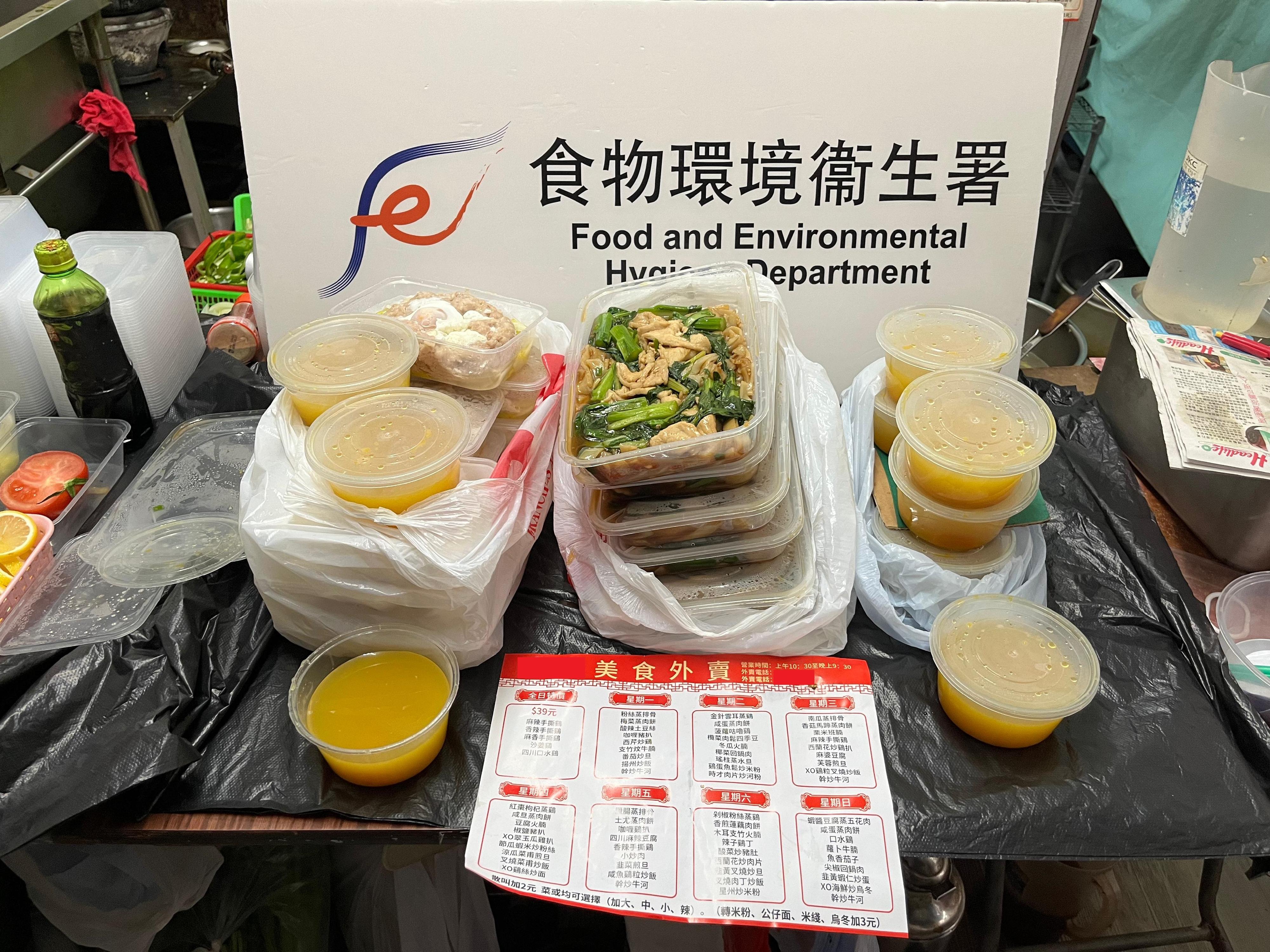 The Food and Environmental Hygiene Department raided an unlicensed food factory in Causeway Bay during a blitz operation today (March 19). Photo shows the food seized in the operation.