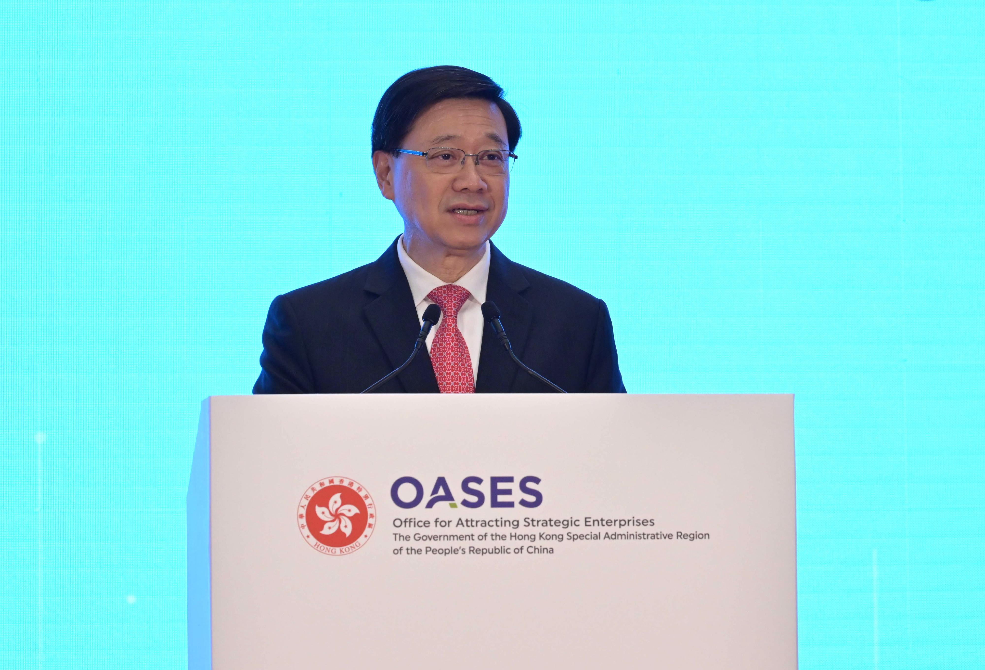 The Chief Executive, Mr John Lee, speaks at the OASES Partnership Signing Ceremony held by the Office for Attracting Strategic Enterprises today (March 20).