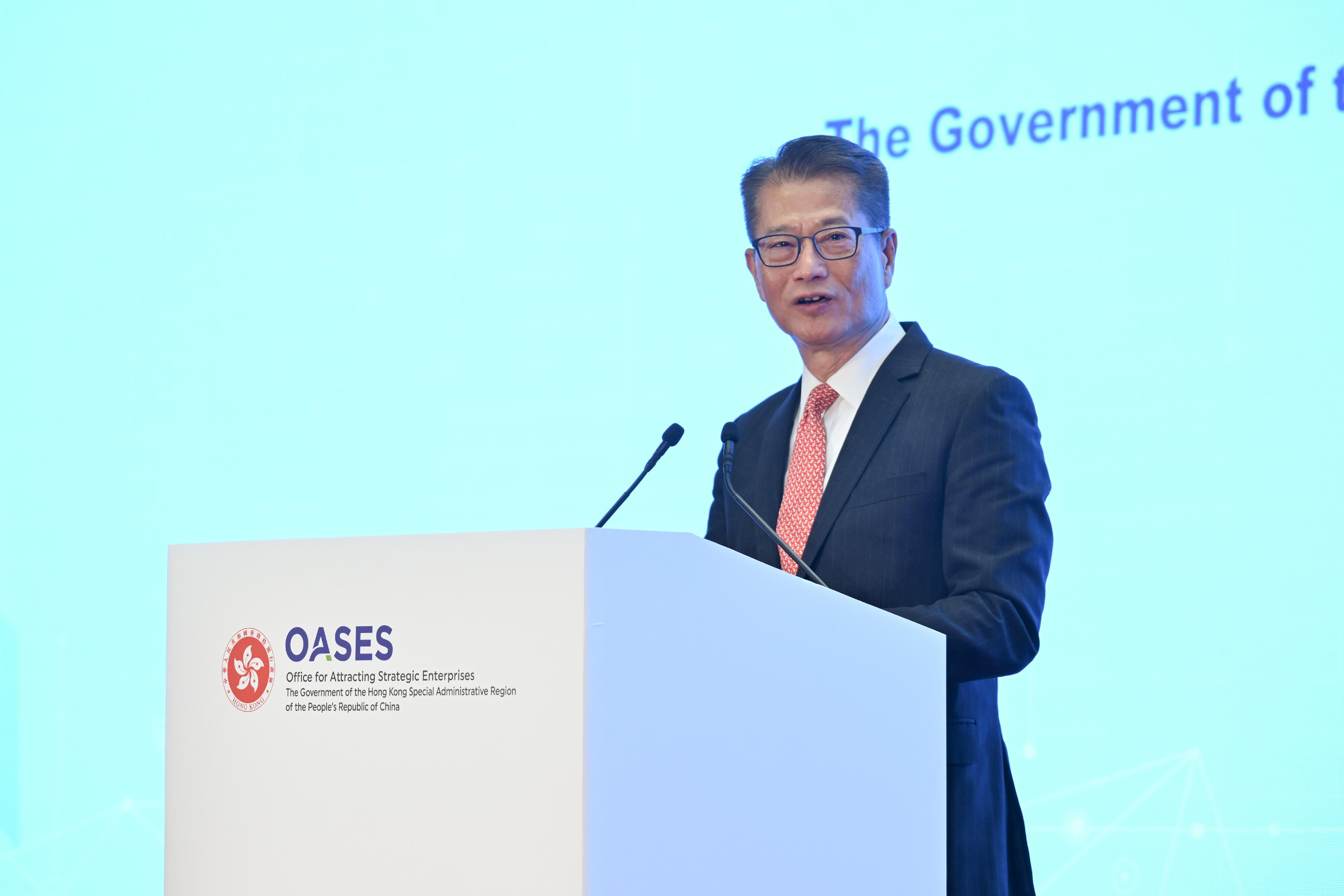 The Financial Secretary, Mr Paul Chan, speaks at the OASES Partnership Signing Ceremony held by the Office for Attracting Strategic Enterprises today (March 20).