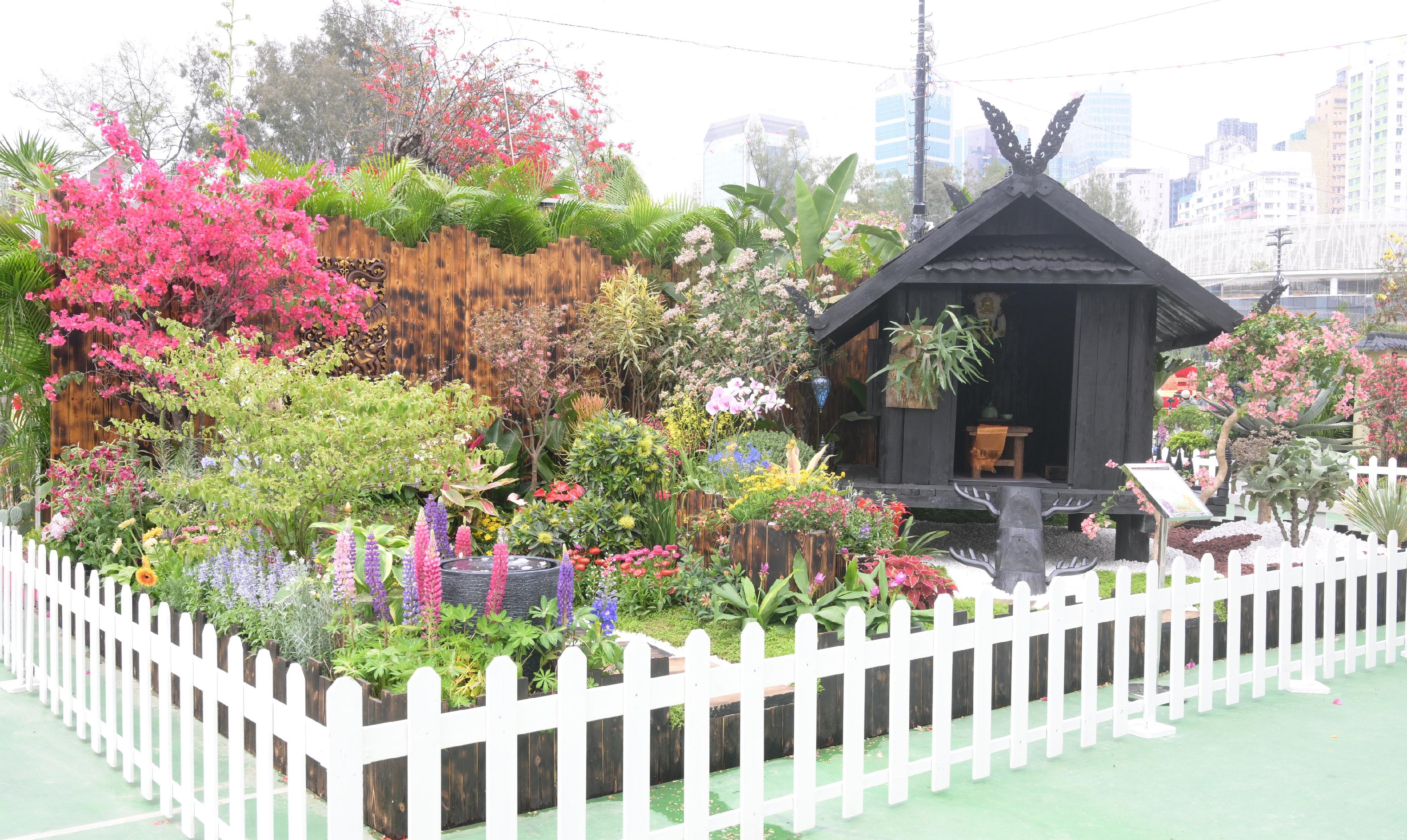 The Hong Kong Flower Show 2024, currently running at Victoria Park, is displaying the winning entries of the Leisure and Cultural Services Department's Western and Oriental Style Garden Plot Competitions, in addition to beautiful floral arrangements and horticultural works. Photo shows Kwai Tsing District's "Joy in Nature", which is the winner of the Oriental Style Garden Plot Competition.
