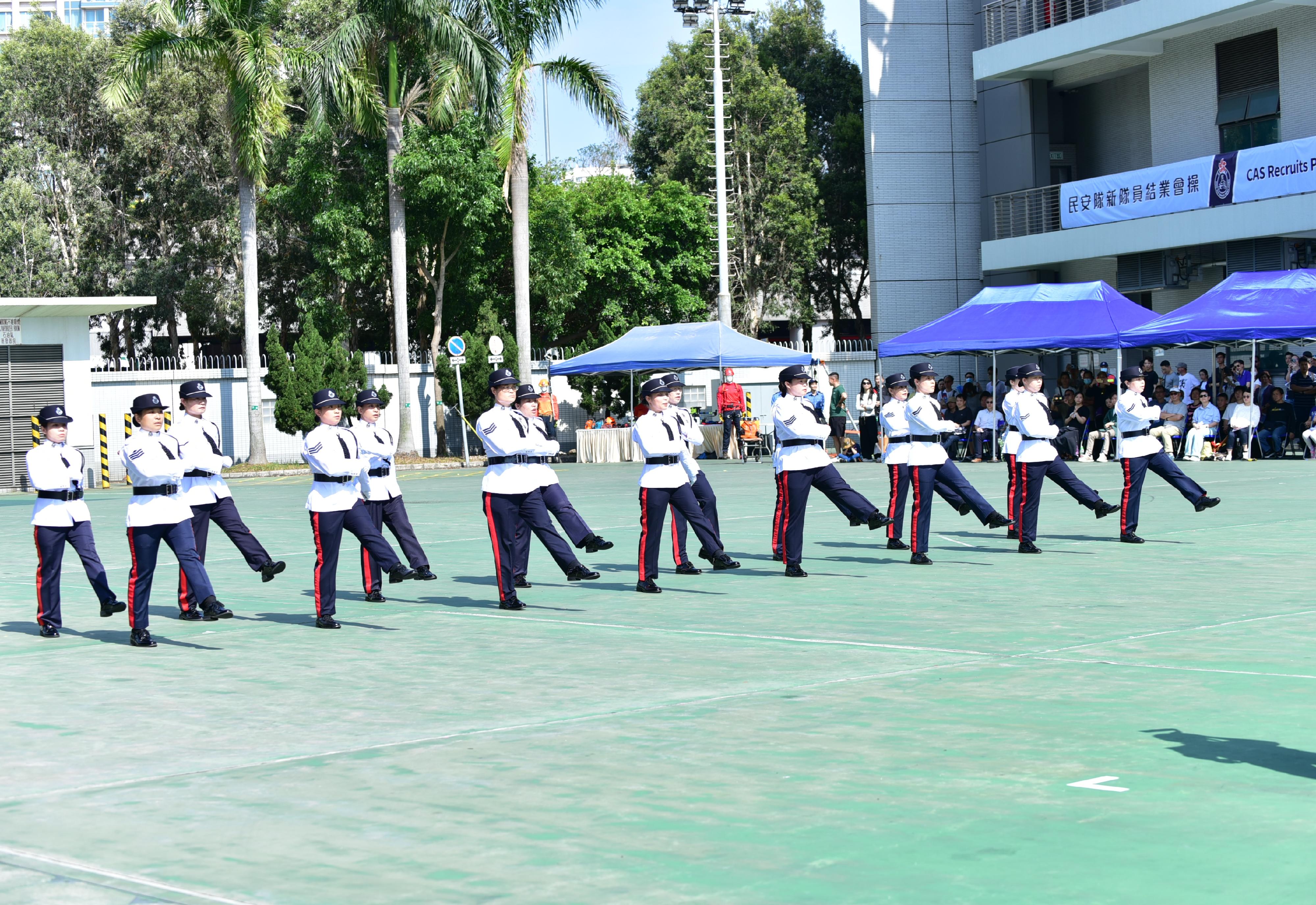 The Civil Aid Service (CAS) held the 87th Recruits Passing-out Parade at its headquarters today (March 24). Photo shows the CAS Guards of Honour performing.