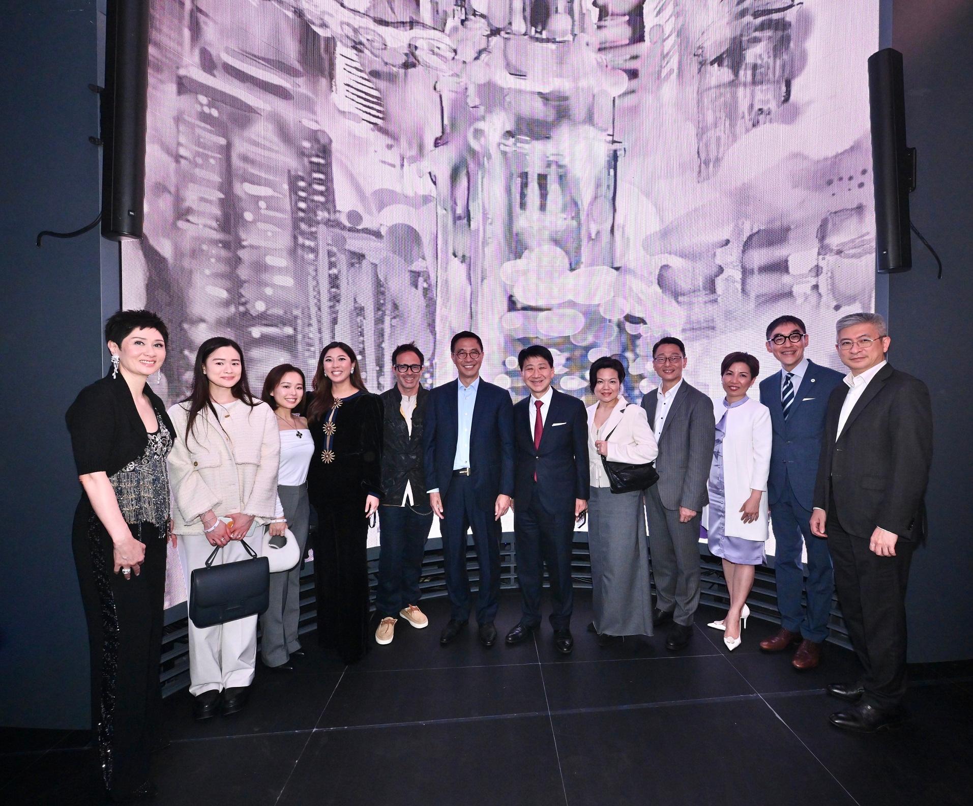 The Secretary for Culture, Sports and Tourism, Mr Kevin Yeung, officiated at the launching ceremony of "Voyage with Van Gogh" of "Art@Harbour 2024" today (March 28). Picture shows Mr Yeung (sixth left); the Director of Leisure and Cultural Services, Mr Vincent Liu (fourth right); member of the Mega Arts and Cultural Events Committee Ms Yolanda Ng (third right); the Chairman of the Museum Advisory Committee, Professor Douglas So (second right); the Chairman of the First Initiative Foundation (FIF), Ms Michelle Ong (first left); the Managing Director of the FIF, Ms Amanda Cheung (fourth left); and the Spanish Digital Artist of VISURA Studio, Vritis (fifth left), at the exhibition.