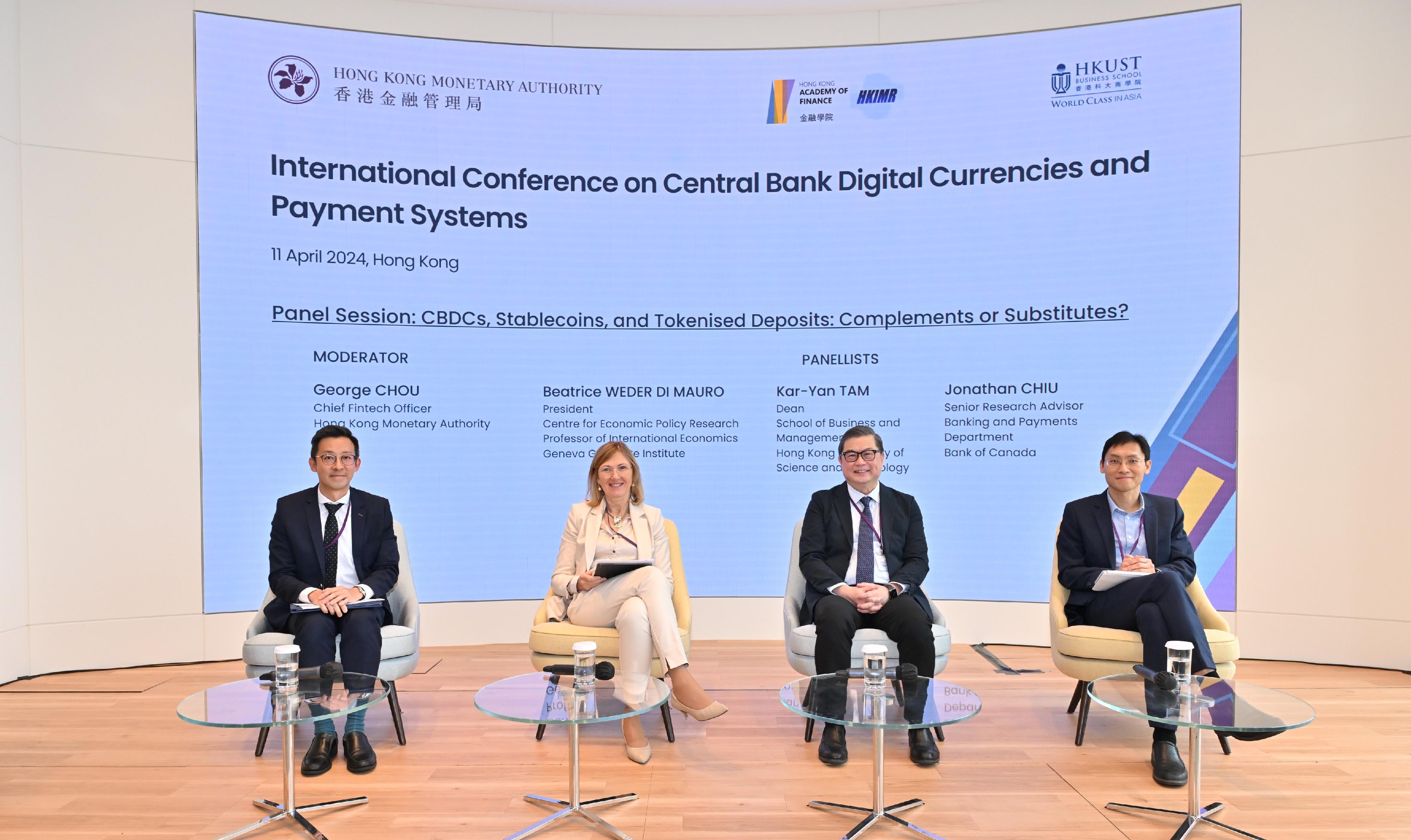 The Chief Fintech Officer of the Hong Kong Monetary Authority, Mr George Chou, moderates a panel discussion titled "CBDCs, Stablecoins, and Tokenised Deposits: Complements or Substitutes?" with Senior Research Advisor, Banking and Payments Department of Bank of Canada, Dr Jonathan Chiu; the Dean, School of Business and Management of The Hong Kong University of Science and Technology, Professor Tam Kar-yan; and the President of Centre for Economic Policy Research and Professor of International Economics of Geneva Graduate Institute, Professor Beatrice Weder Di Mauro.