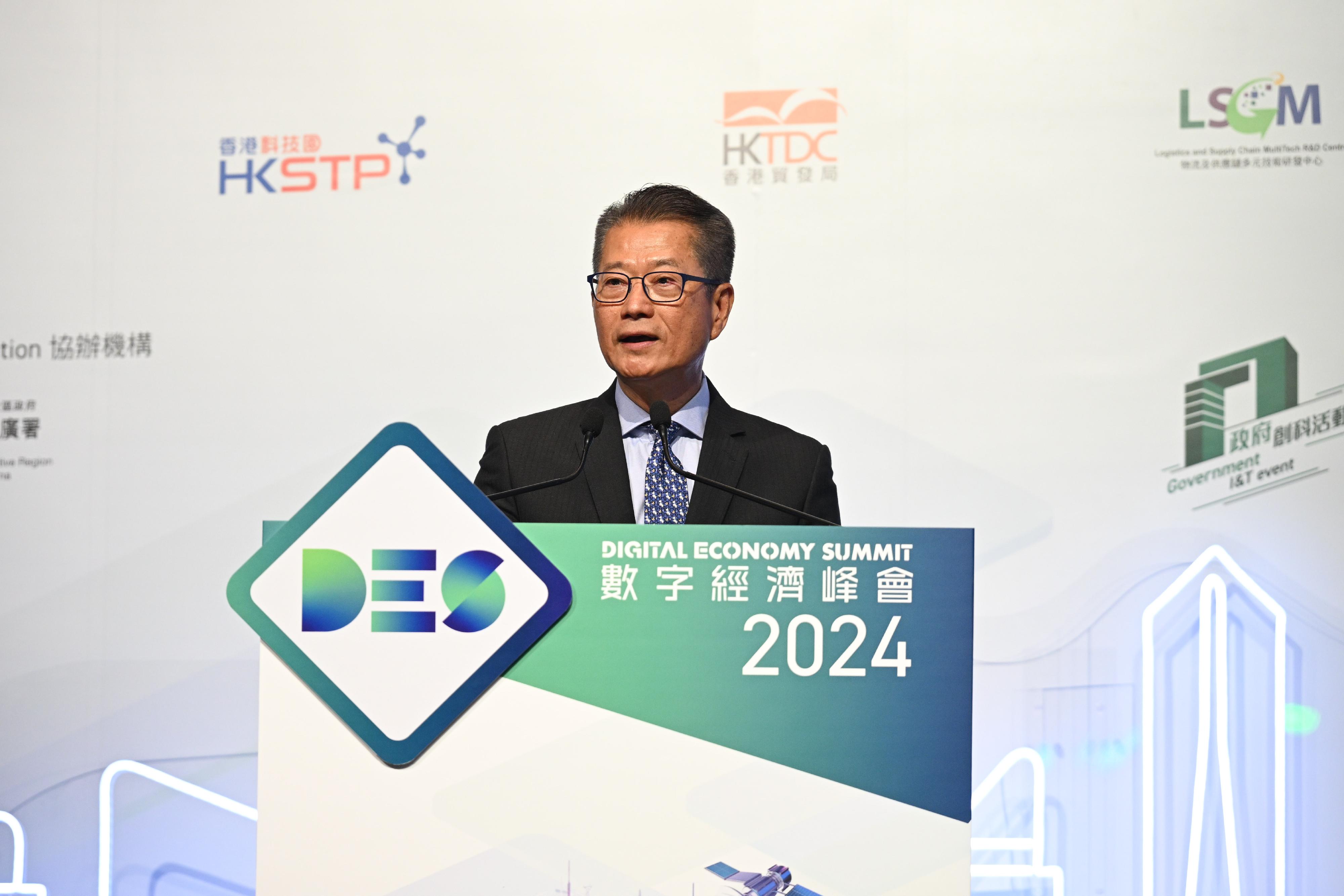 The Financial Secretary, Mr Paul Chan, speaks at the Visionary Forum of the Digital Economy Summit 2024 today (April 12). 