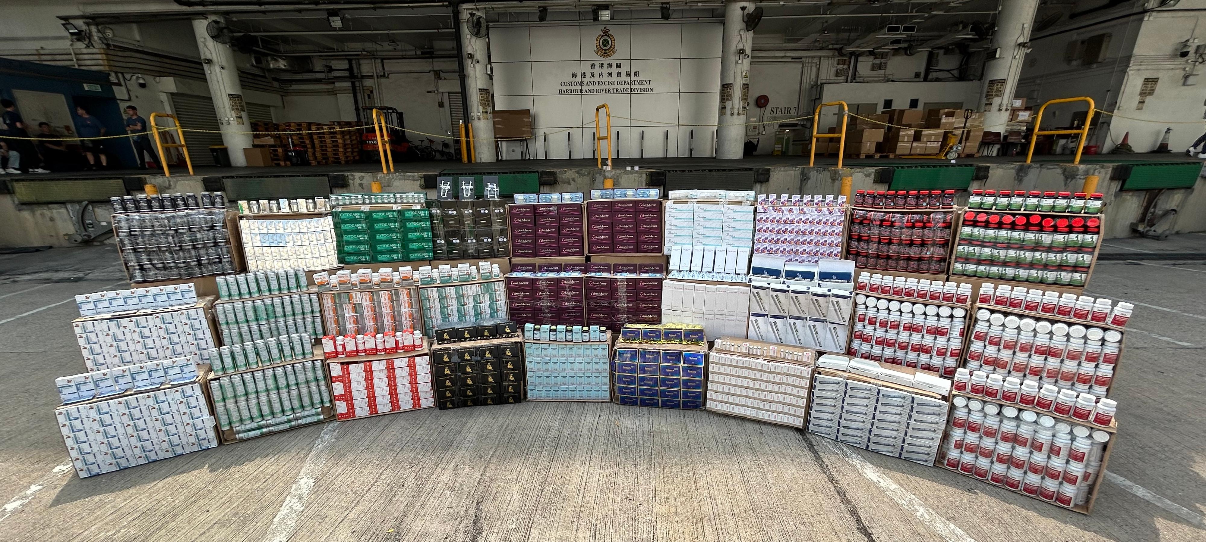 Hong Kong Customs on April 2 detected a suspected smuggling case involving a river trade vessel. A large batch of suspected smuggled goods, including beauty needles, health products and pharmaceutical products, with a total estimated market value of about $20 million was seized. Photo shows the suspected smuggled goods seized.