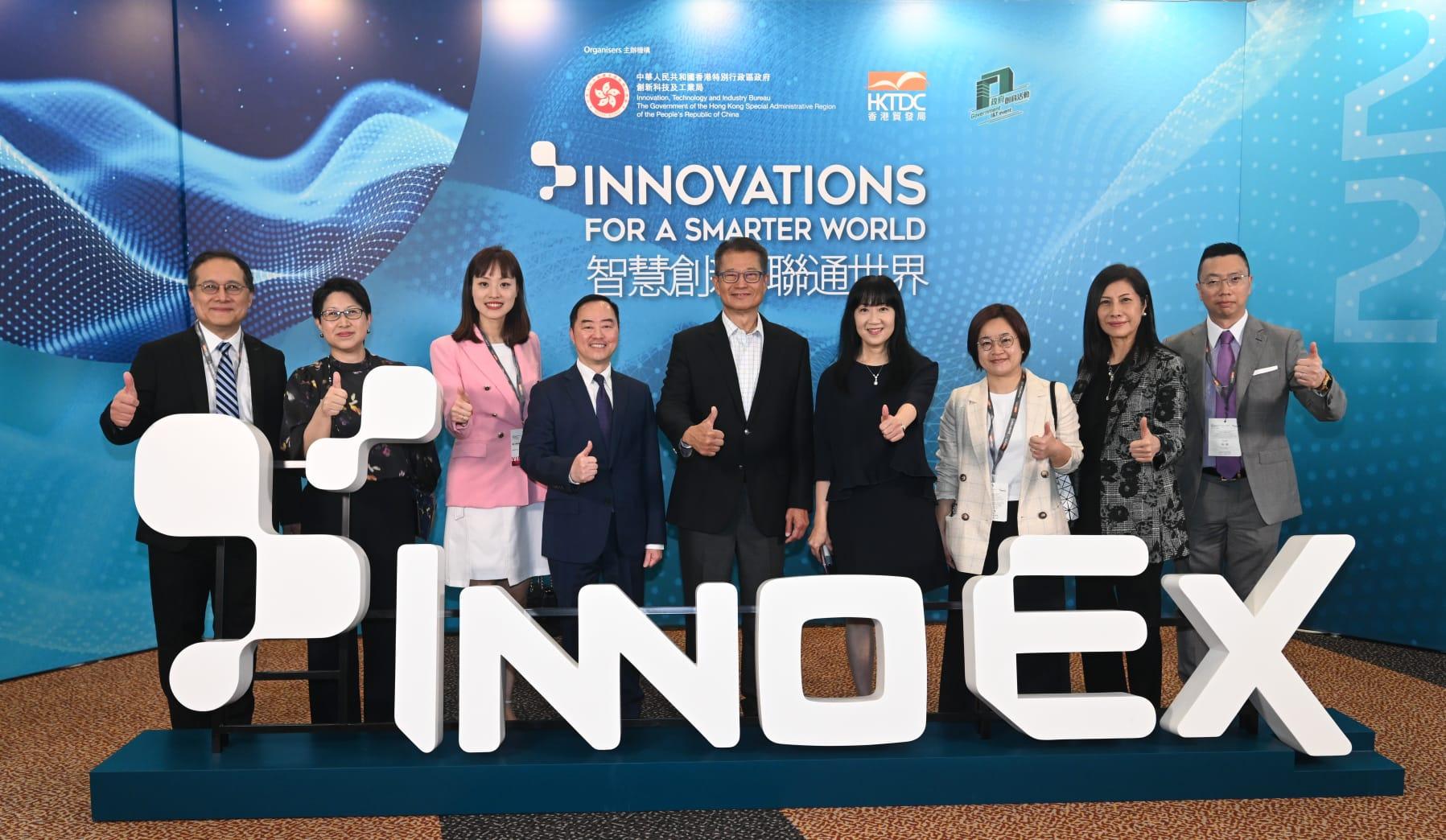 The Financial Secretary, Mr Paul Chan, visited the InnoEX today (April 13). Mr Chan (centre) is pictured with the Under Secretary for Innovation, Technology and Industry, Ms Lillian Cheong (third left); the Government Chief Information Officer, Mr Tony Wong (fourth left); the Executive Director of the Hong Kong Trade Development Council, Ms Margaret Fong (fourth right) and other guests.