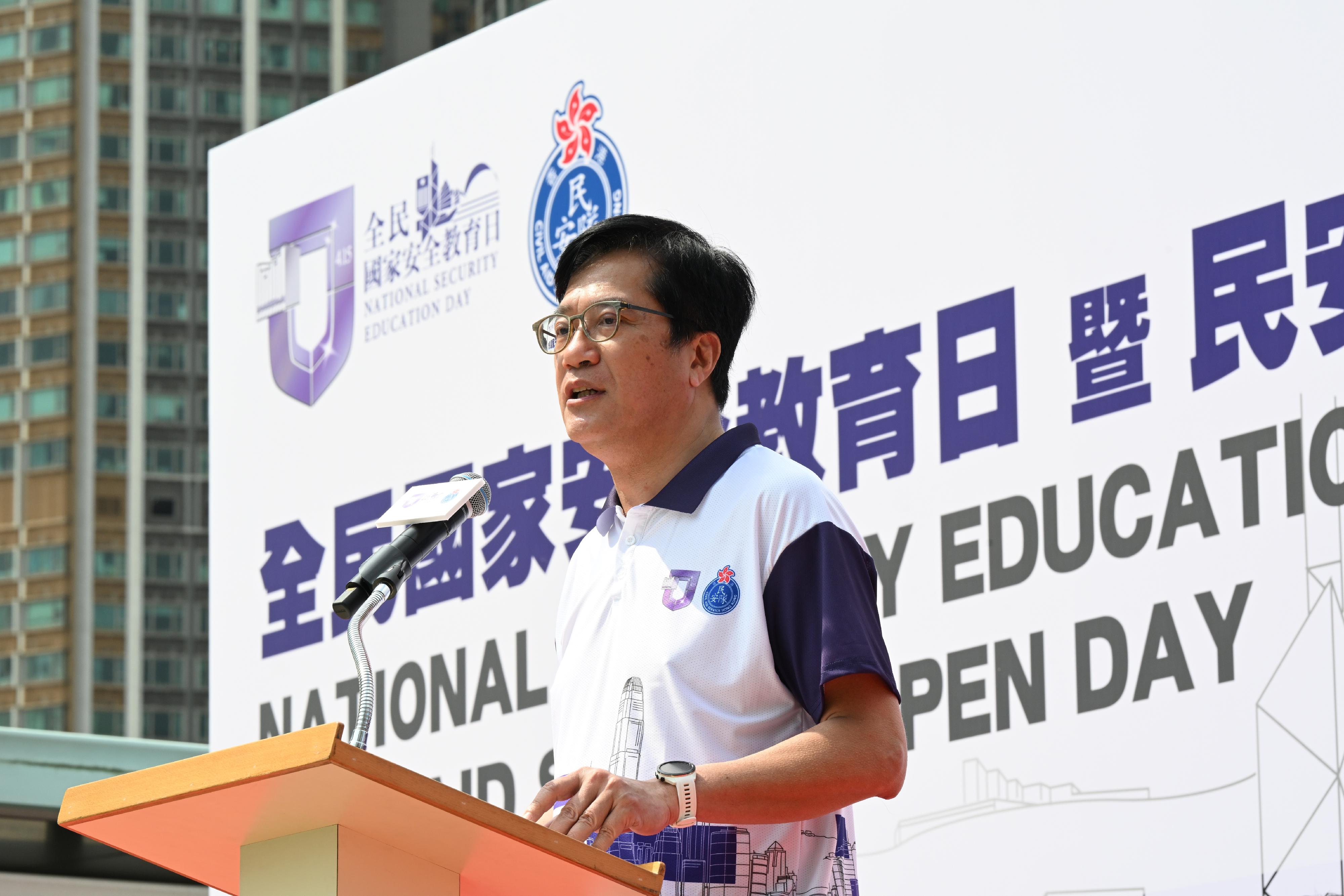 The Civil Aid Service held an open day at its headquarters today (April 14) to promote the National Security Education Day. Photo shows the Deputy Financial Secretary, Mr Michael Wong, giving a speech.