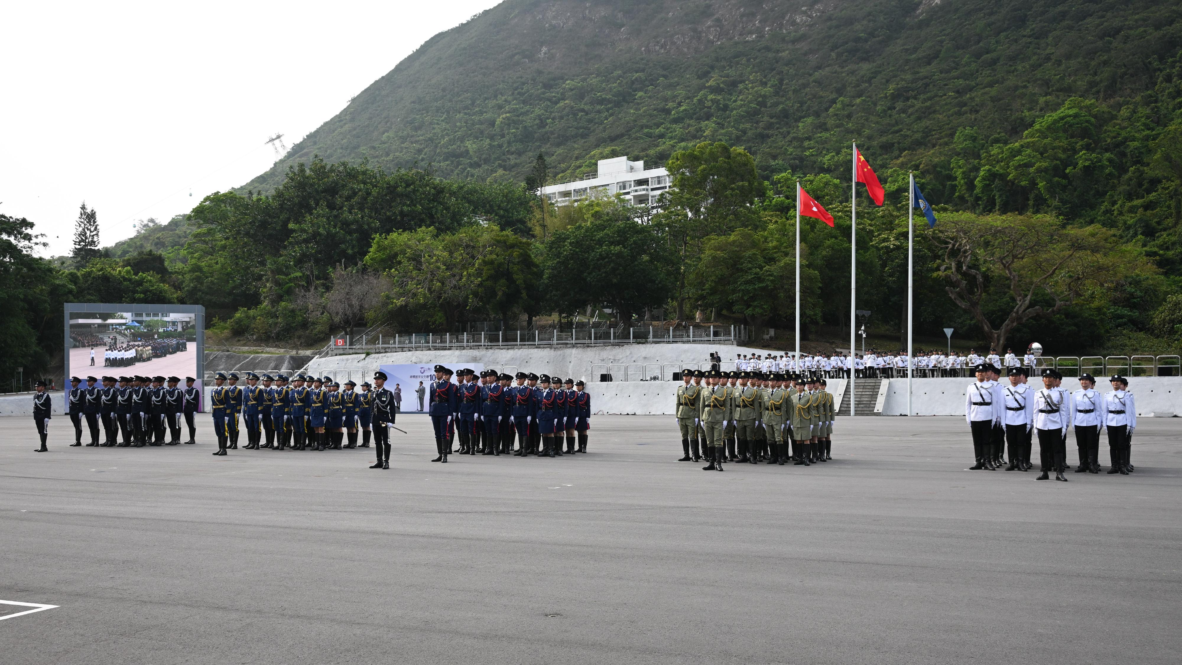 The Security Bureau and its disciplined services jointly held a National Security Education Day flag-raising ceremony at the Hong Kong Police College today (April 15). Photo shows the disciplined services ceremonial guard lining up at the flag-raising ceremony.
