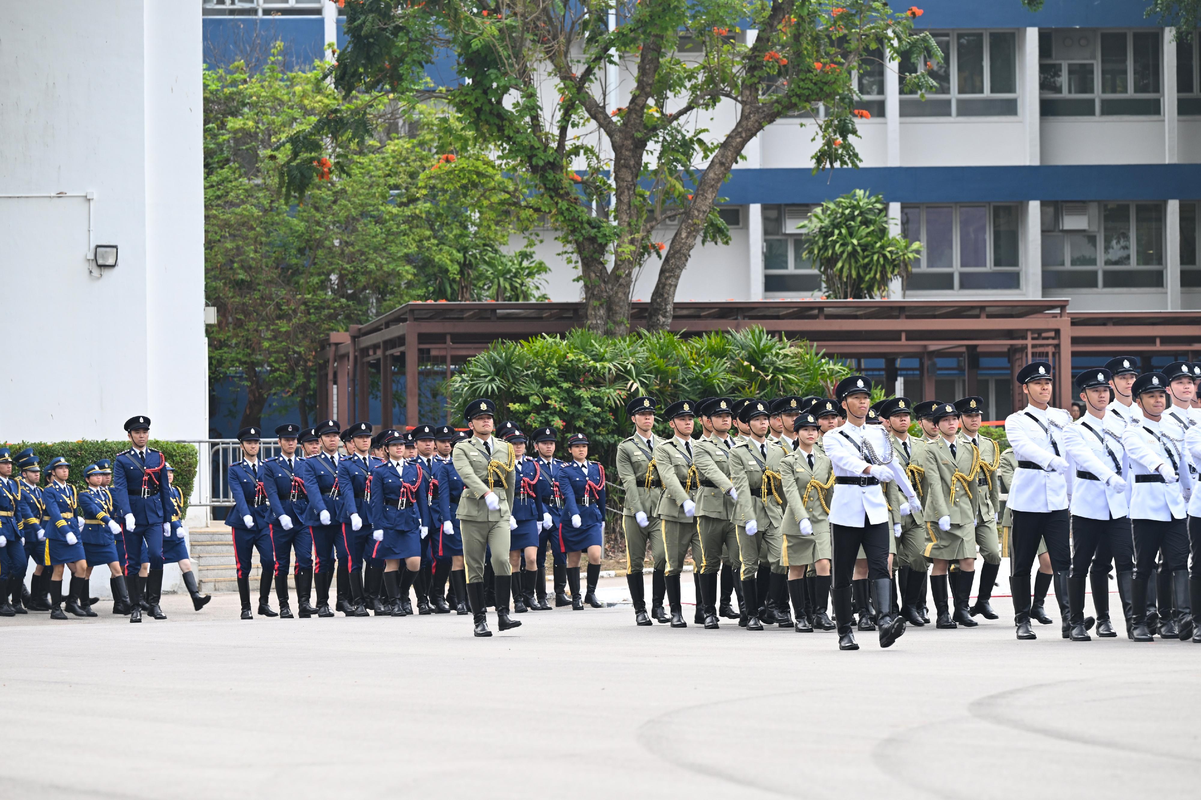 保安局及辖下纪律部队今日（四月十五日）于香港警察学院联合举行「全民国家安全教育日」升旗仪式。图示纪律部队仪仗队步操进场。