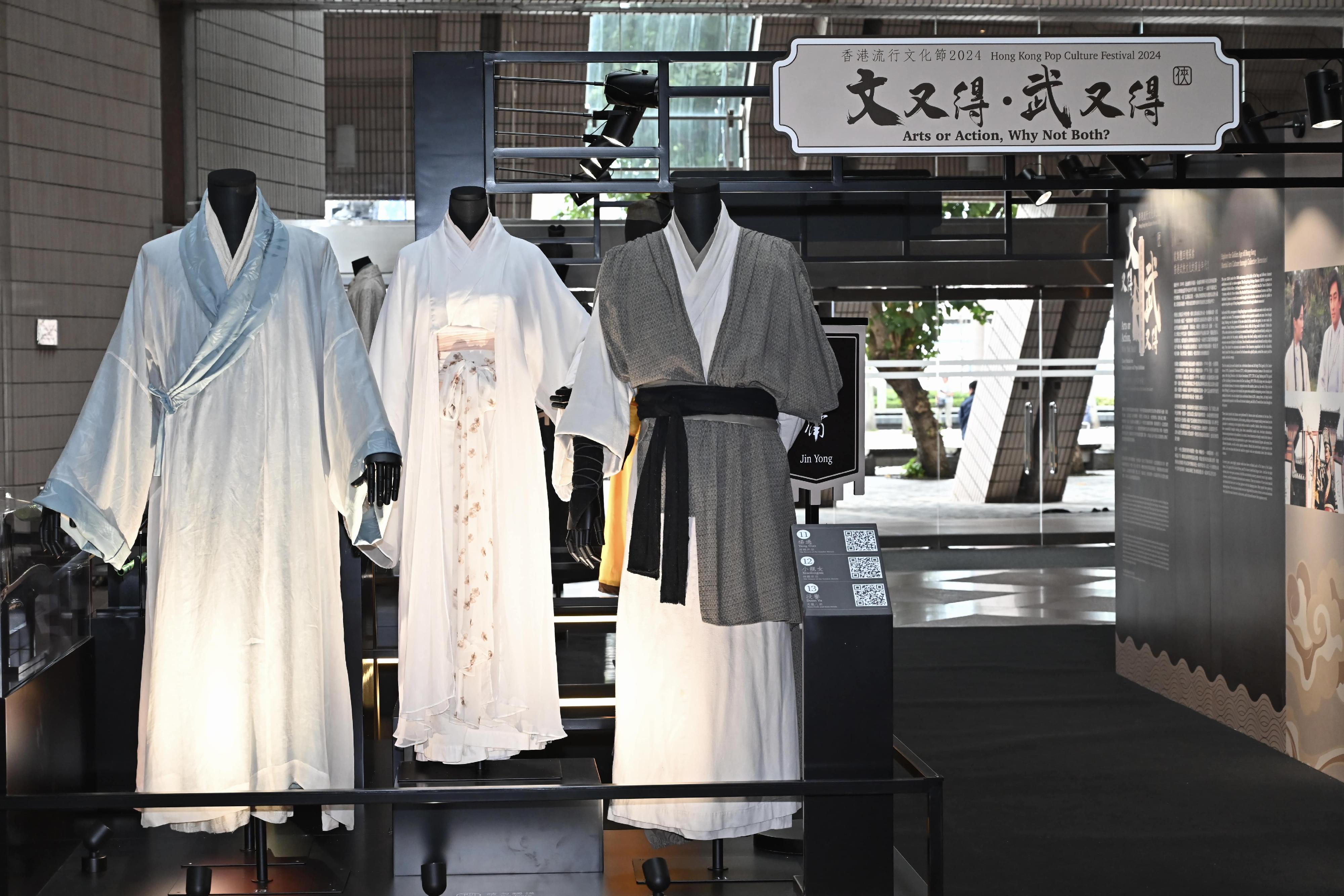 To tie in with its theme "Arts and Action", the second Hong Kong Pop Culture Festival is running a vast range of programmes inspired by martial arts novels. Among them is the "Classic Martial Arts Drama Costumes and Props Exhibition" under the "Arts or Action, Why Not Both?" series, which opened today (April 17) at the foyer of the Hong Kong Cultural Centre. Photo shows the costumes of Yang Guo (right) and Xiaolongnü (Little Dragon Maiden) (centre) in "The Return of the Condor Heroes", and Duan Yu (left) in "Demi-Gods and Semi-Devils". 