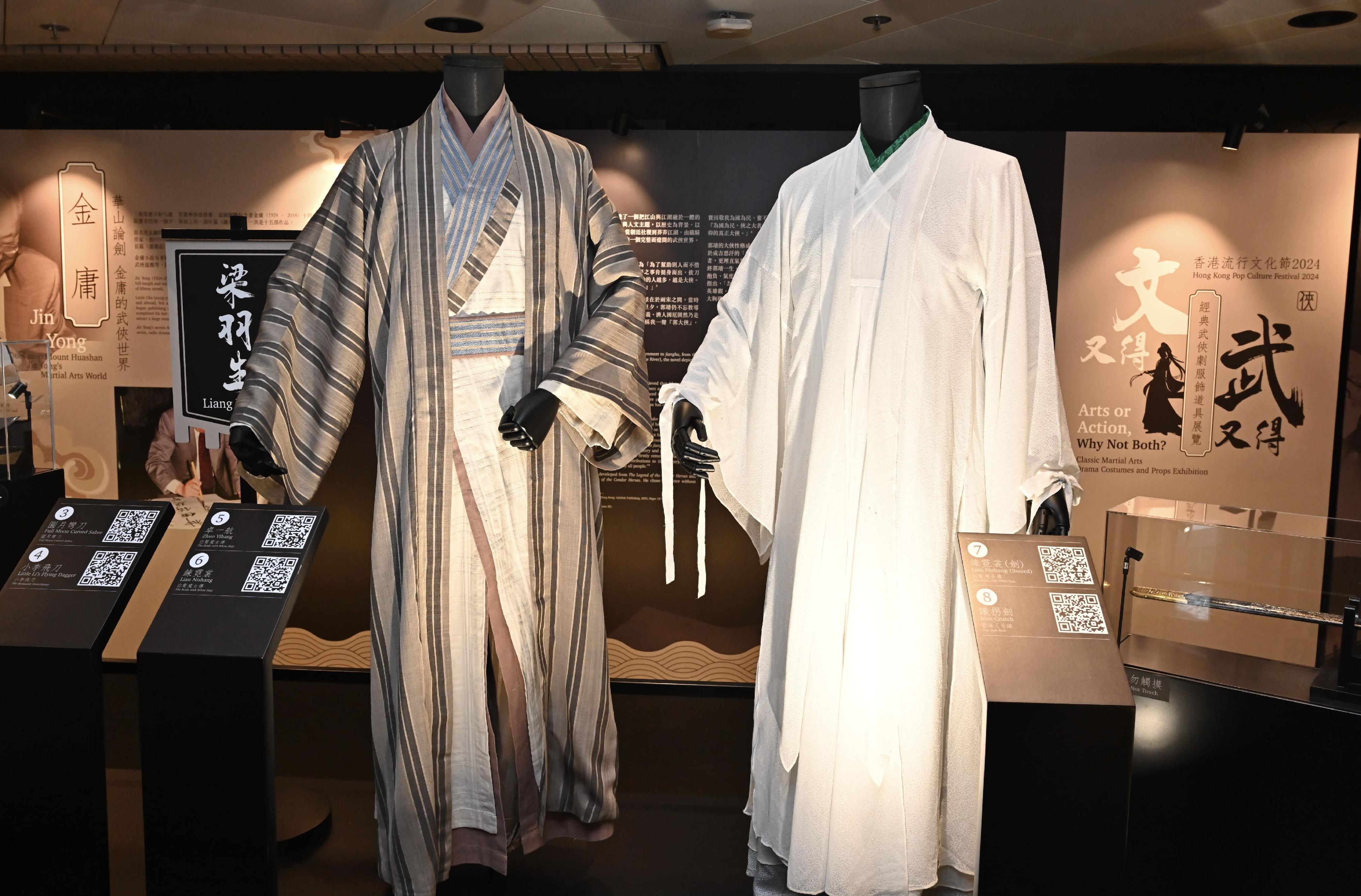To tie in with its theme "Arts and Action", the second Hong Kong Pop Culture Festival is running a vast range of programmes inspired by martial arts novels. Among them is the "Classic Martial Arts Drama Costumes and Props Exhibition" under the "Arts or Action, Why Not Both?" series, which opened today (April 17) at the foyer of the Hong Kong Cultural Centre. Photo shows the costumes of Zhuo Yihang (left) and Lian Nishang (right) in "The Bride with White Hair".