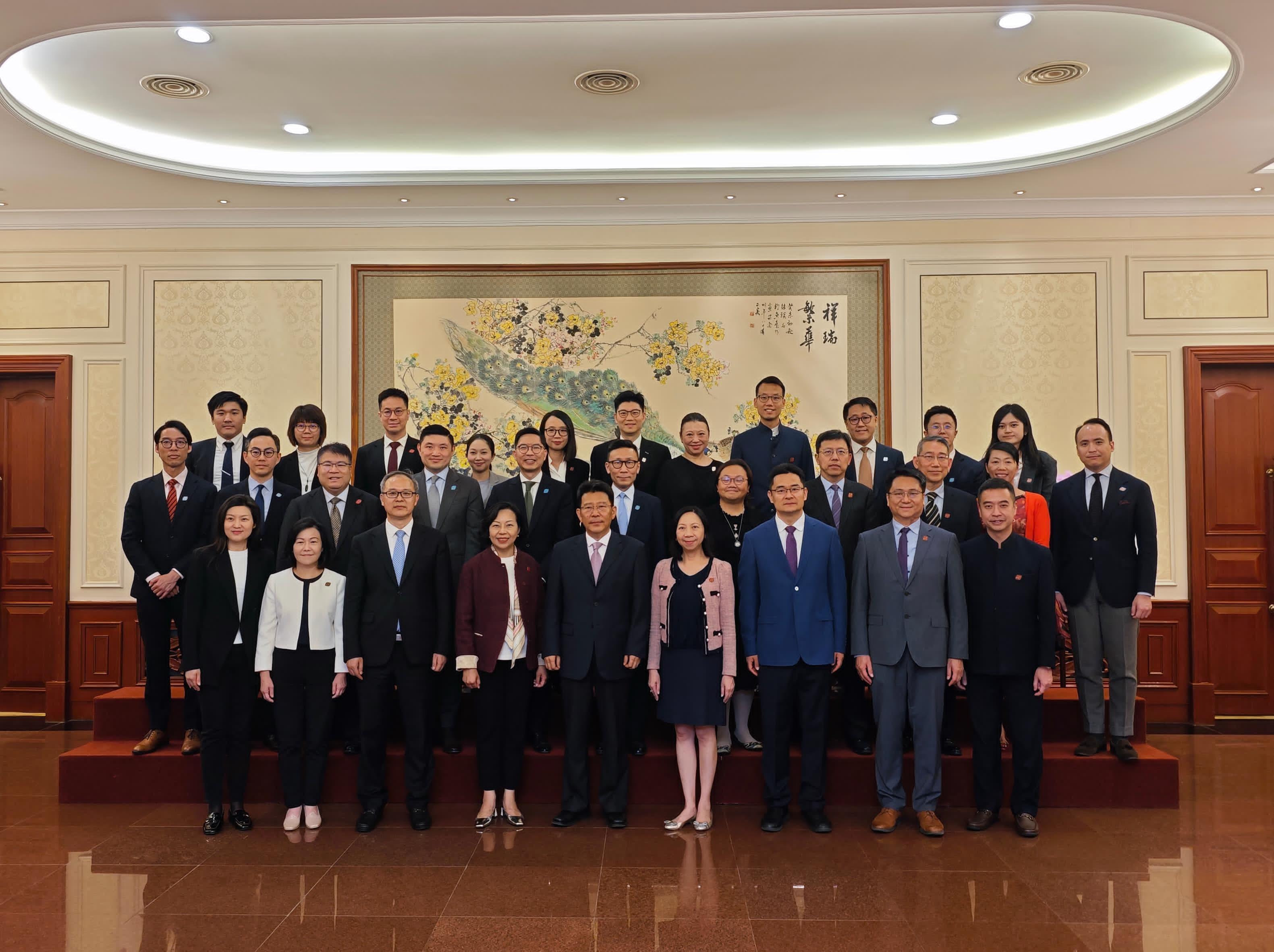 The delegation of the District Officers (DOs) of the Hong Kong Special Administrative Region Government led by the Secretary for Home and Youth Affairs, Miss Alice Mak, continued its study programme in Beijing on district governance today (April 18). Photo shows the Deputy Director of the Hong Kong and Macao Affairs Office of the State Council Mr Wang Linggui (front row, centre); Miss Mak (front row, fourth left); the Permanent Secretary for Home and Youth Affairs, Ms Shirley Lam (front row, fourth right); the Director of Home Affairs, Mrs Alice Cheung (front row, second left) and 18 DOs.
