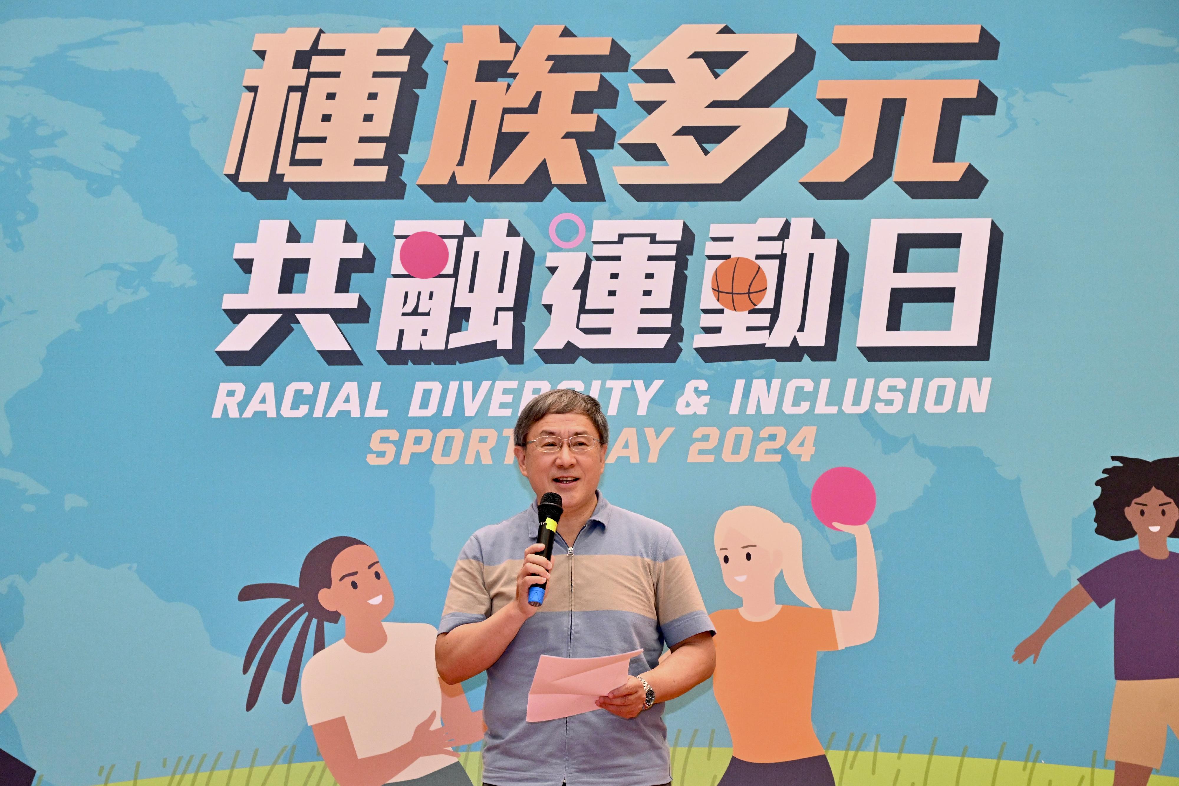 The Deputy Chief Secretary for Administration, Mr Cheuk Wing-hing, speaks at the Opening Ceremony of the Racial Diversity and Inclusion Sports Day 2024 today (April 21).