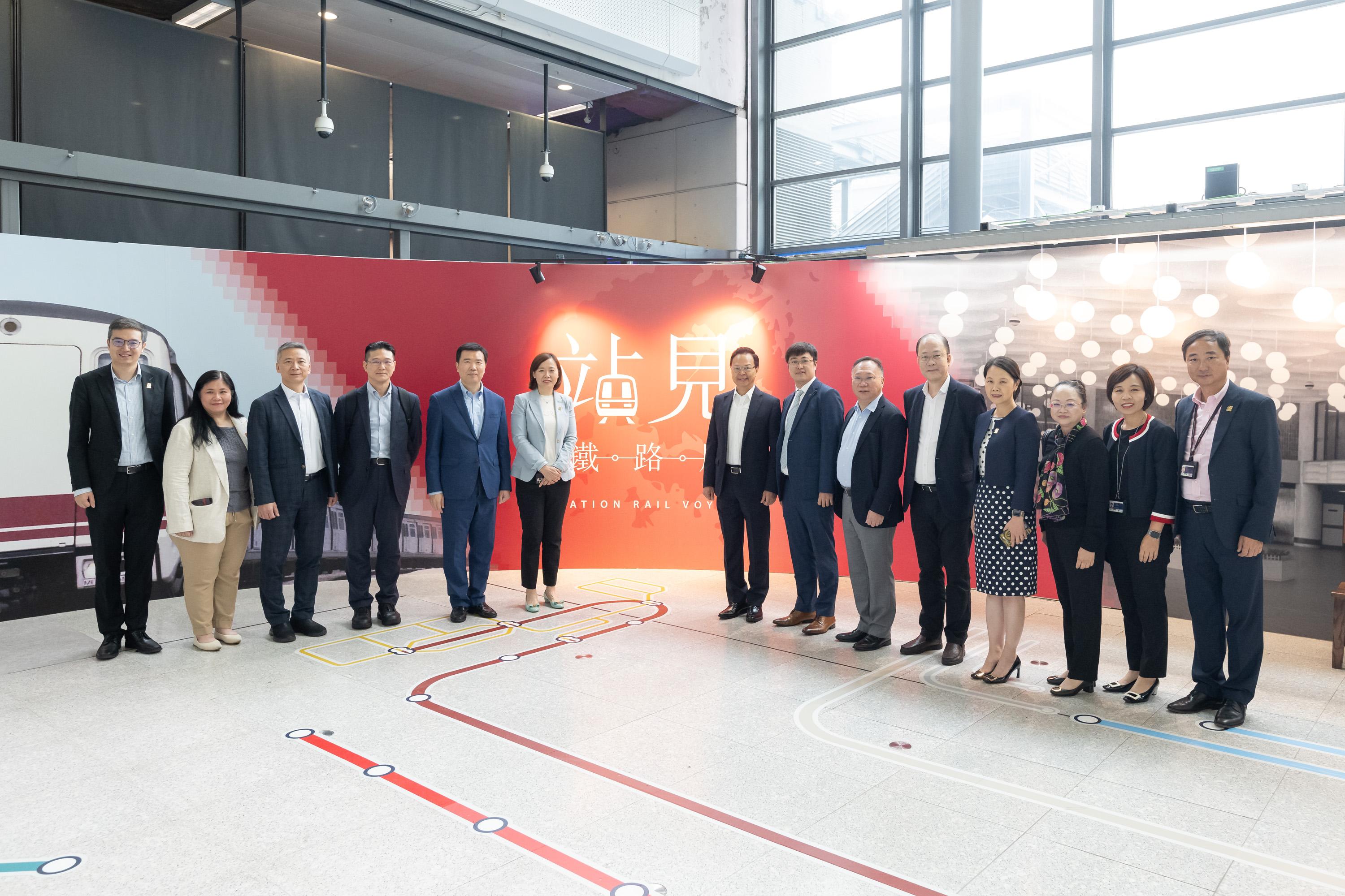 The Legislative Council (LegCo) Panel on Transport visits the "Station Rail Voyage" Exhibition of the MTR Corporation Limited at Hung Hom Station today (April 24). Photo shows LegCo Members and MTR representatives at the "Station Rail Voyage" Exhibition.