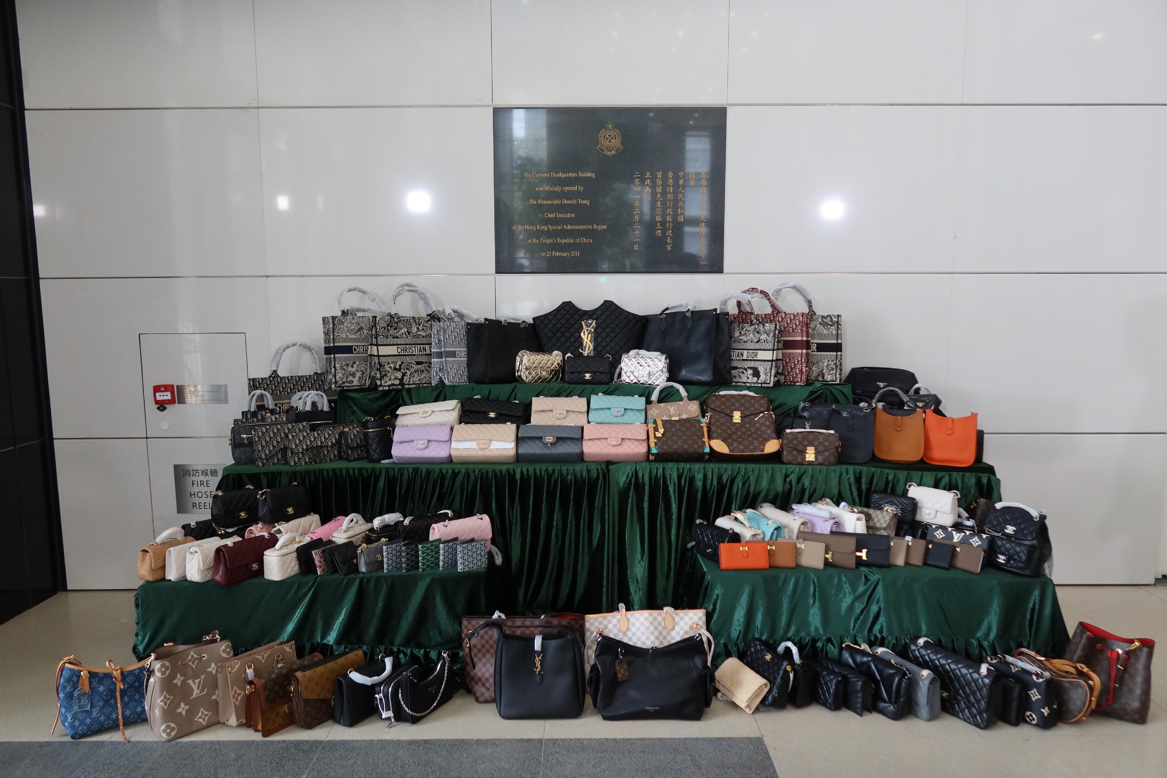 Hong Kong Customs yesterday (April 24) conducted a special operation in Mong Kok to combat the sale of counterfeit goods and seized about 4 900 items of suspected counterfeit goods with an estimated market value of about $2.1 million. Photo shows the suspected counterfeit goods seized. 