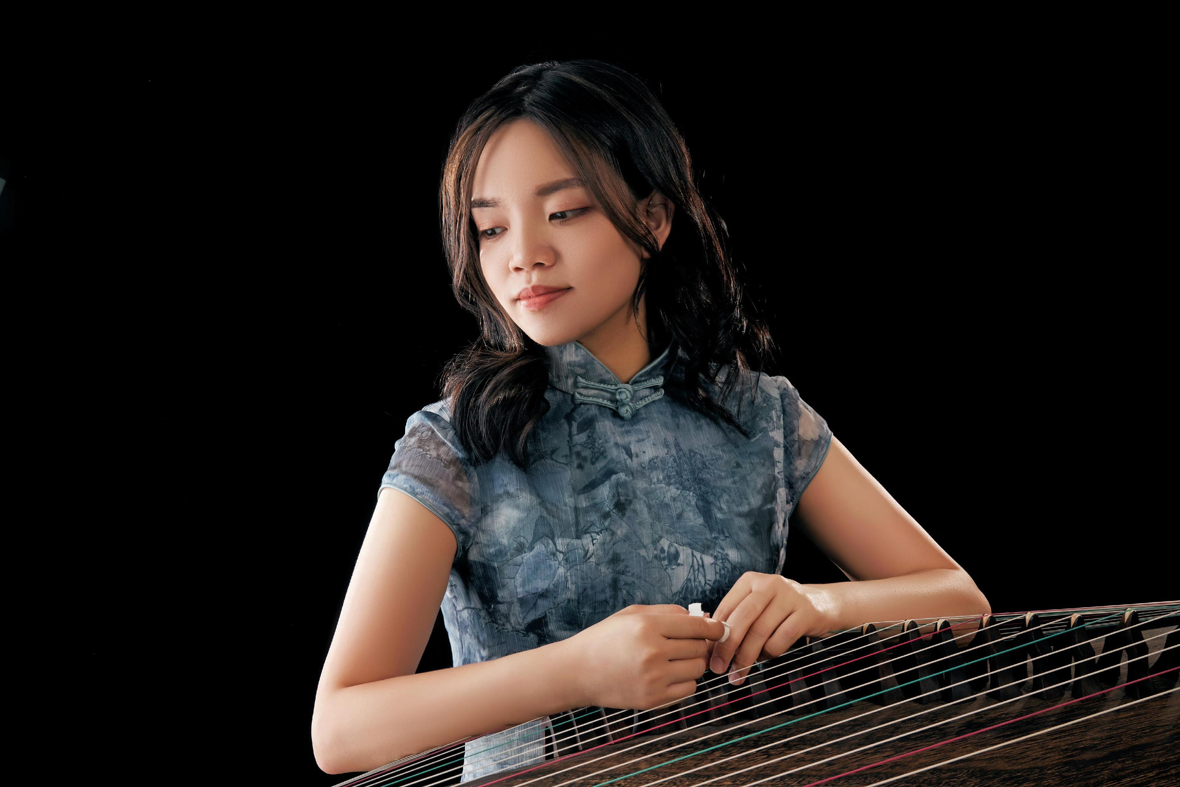 The "Tajik Music with Sirojiddin Juraev - Tradition and Innovation on the Silk Road" concert will be held on June 17. Photo shows local guzheng performer Jessie Law. 
