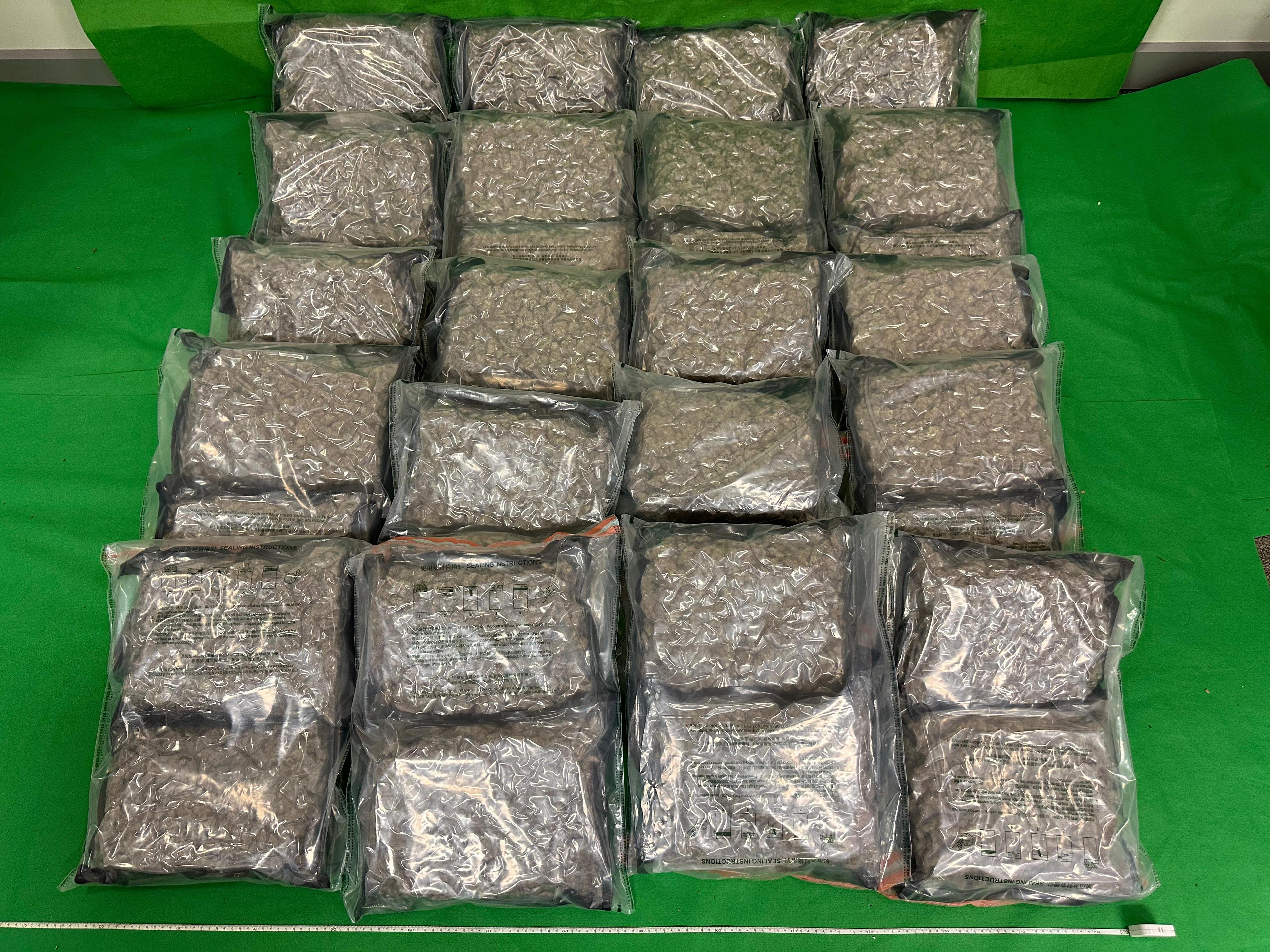 Hong Kong Customs yesterday (April 28) detected three drug trafficking cases involving baggage concealment at Hong Kong International Airport and seized a total of about 32 kilograms of suspected methamphetamine, 27kg of suspected cannabis buds and 15kg of suspected heroin with a total estimated market value of about $37 million. Seven men were arrested. Photo shows the suspected cannabis buds seized in the first case.


