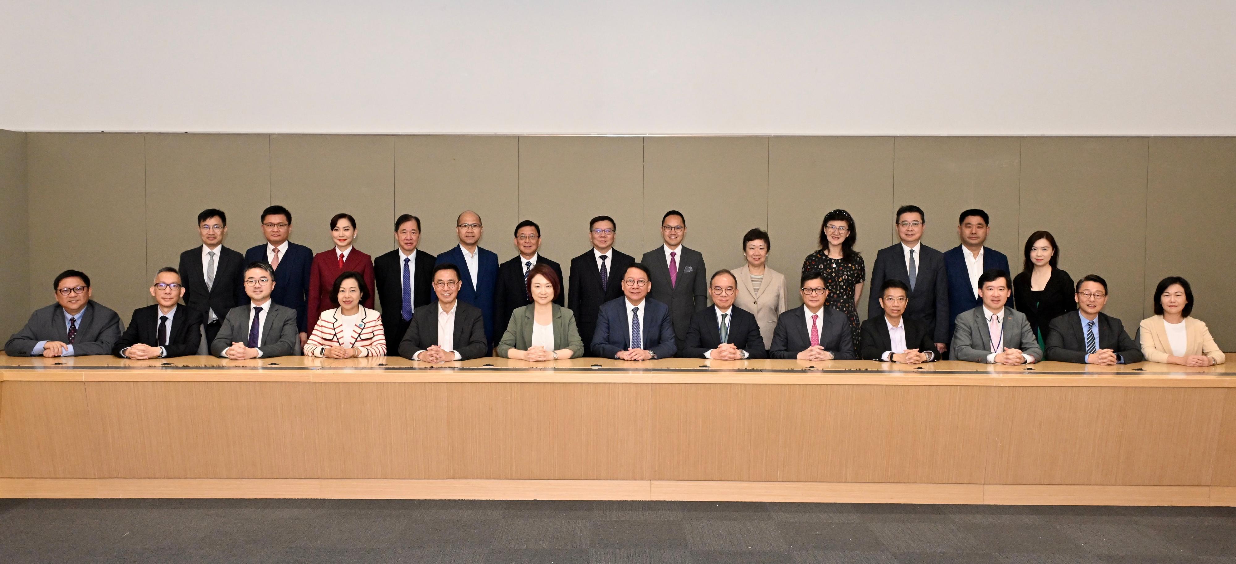 The Working Group on Patriotic Education under the Constitution and Basic Law Promotion Steering Committee (CBLPSC) today (April 29) holds its first meeting. Photo shows the Chairman of the CBLPSC and Chief Secretary for Administration, Mr Chan Kwok-ki (front row, centre), together with the Convenor of the Working Group, Ms Starry Lee (front row, sixth left), the Secretary for Constitutional and Mainland Affairs, Mr Erick Tsang Kwok-wai (front row, sixth right), and other members of the Working Group before the meeting.