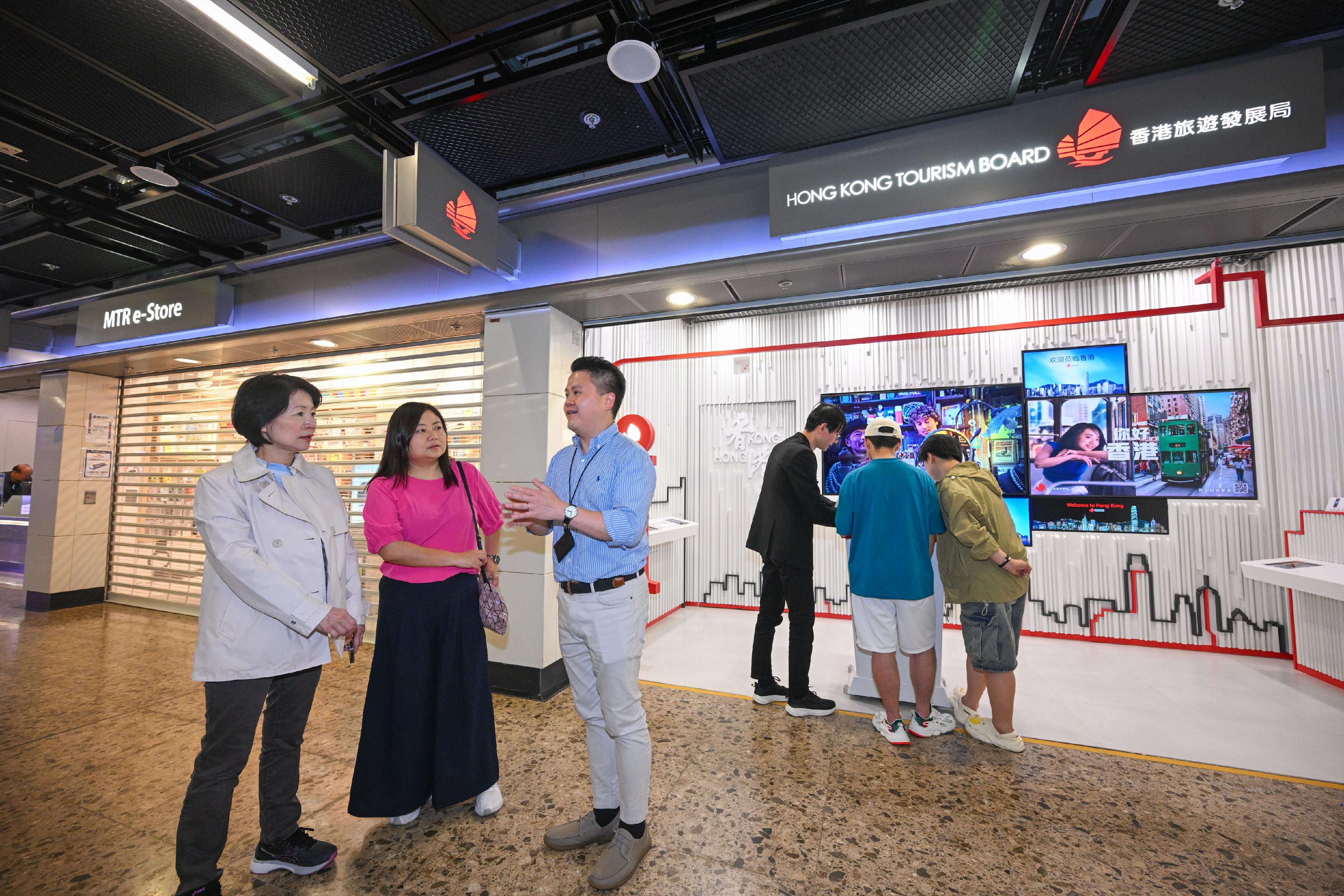 The Commissioner for Tourism, Ms Vivian Sum (first left), today (May 1) visited the Hong Kong West Kowloon Station Visitor Centre to monitor tourist activities during the 2024 Labour Day Golden Week of the Mainland.