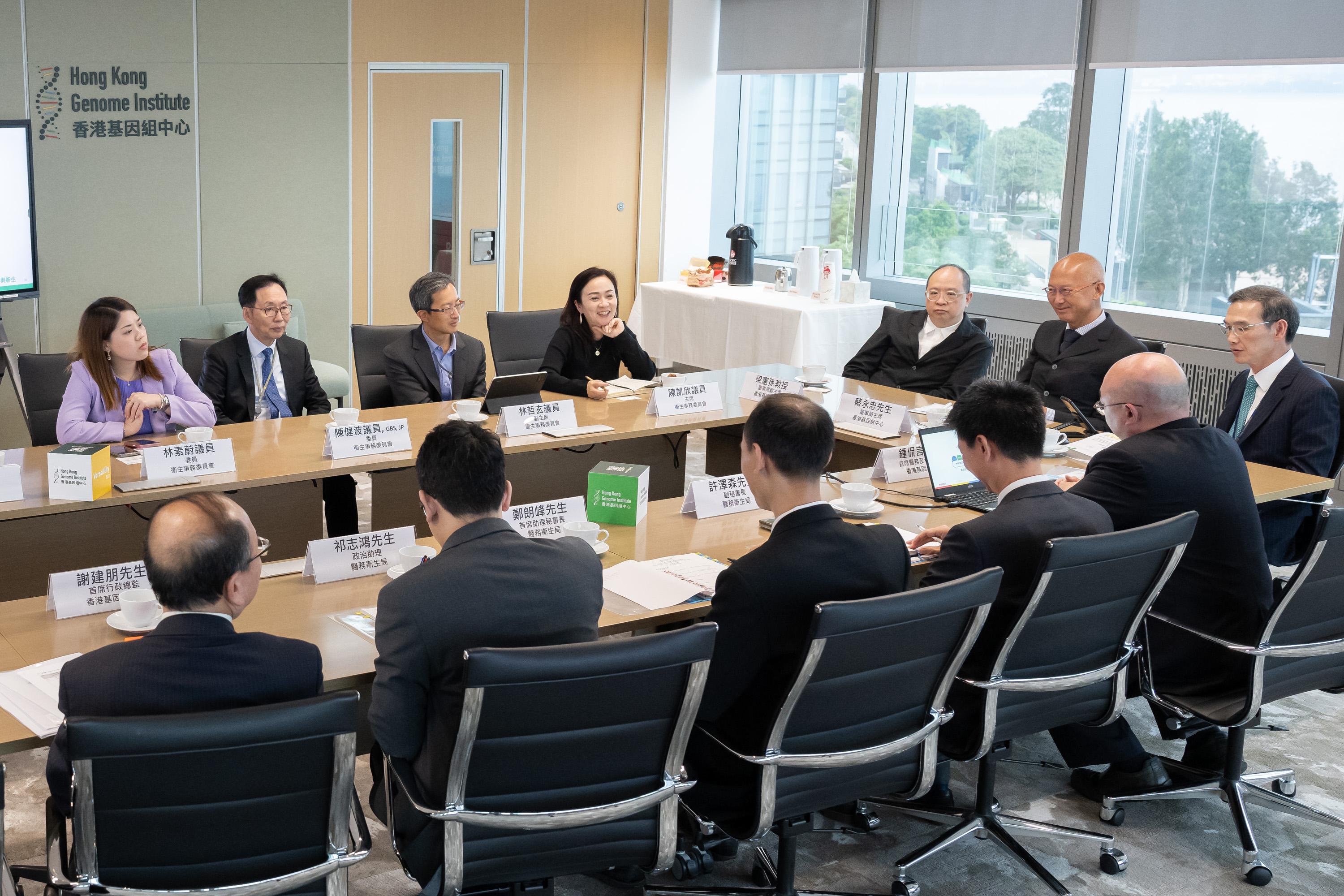 The Legislative Council (LegCo) Panel on Health Services visits the Hong Kong Genome Institute (HKGI) today (May 2). Photos shows LegCo Members receiving a briefing on the Hong Kong Genome Project by the management team of the HKGI.
