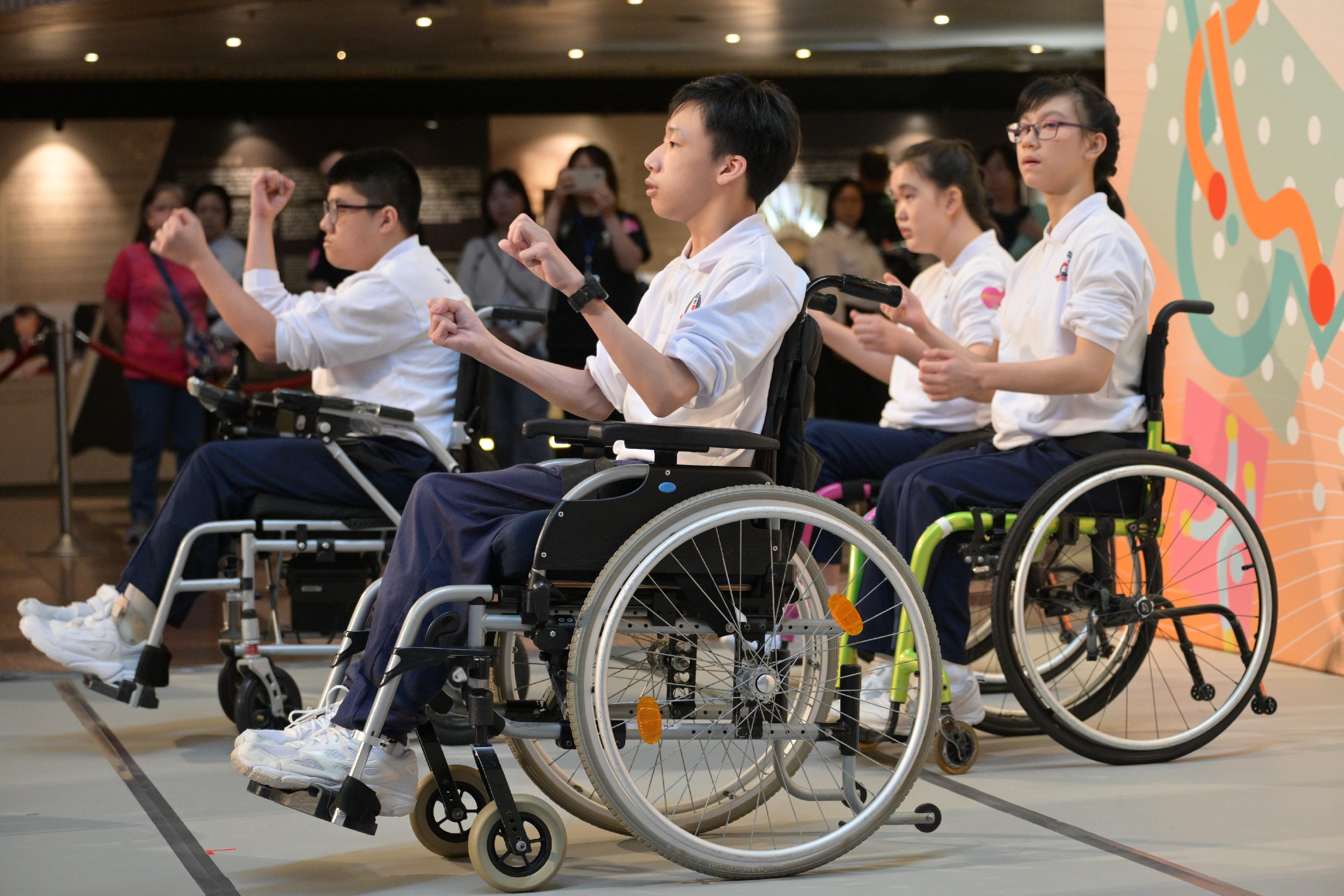 The "Dance for All" Community Care Inclusive Dance Scheme, organised by the Leisure and Cultural Services Department, was launched today (May 5). Photo shows persons with physical disabilities in action at the "Dance with Me" inclusive performance.
