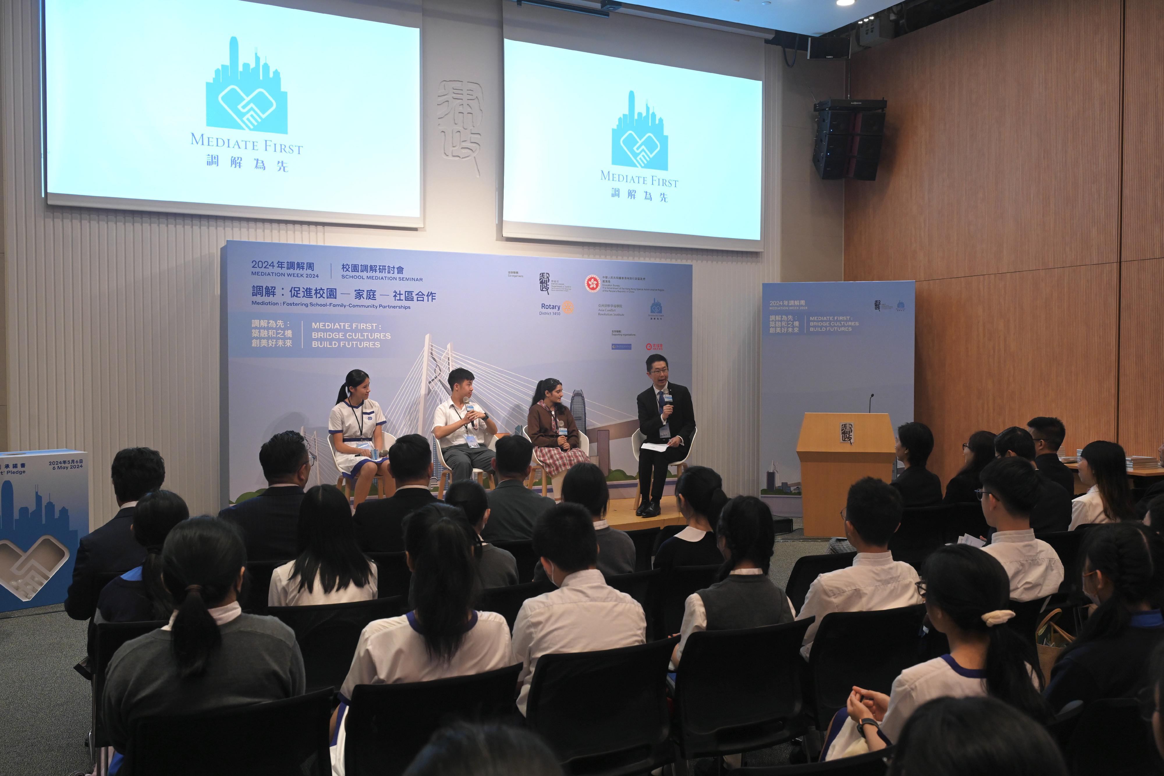 The Mediation Week 2024, a biennial event organised by the Department of Justice, was officially launched today (May 6). The Mediation Week opening was marked by the thematic event: School Mediation Seminar this morning. Photo shows the top three winners in the senior division of the Mediation Essay Competition 2024 at the sharing session.

